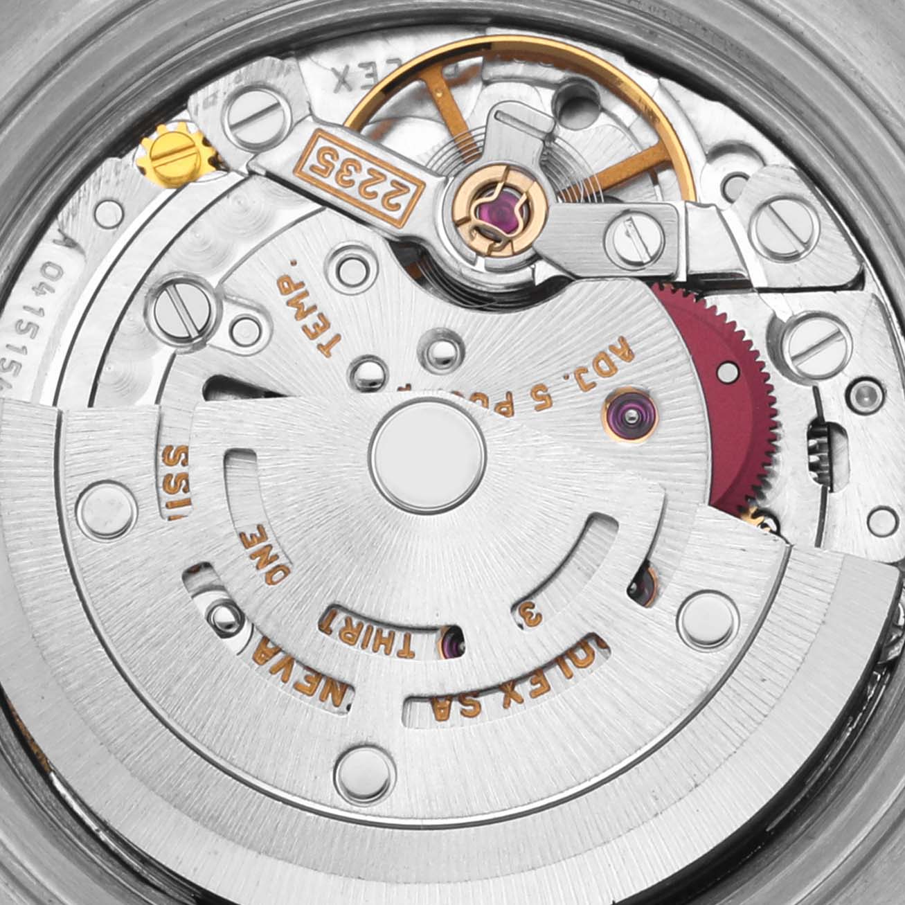 The image shows a close-up of the movement inside a Rolex Date 79240 Women's Stainless Steel White Dial 79240 Women's Stainless Steel White Dial model watch.