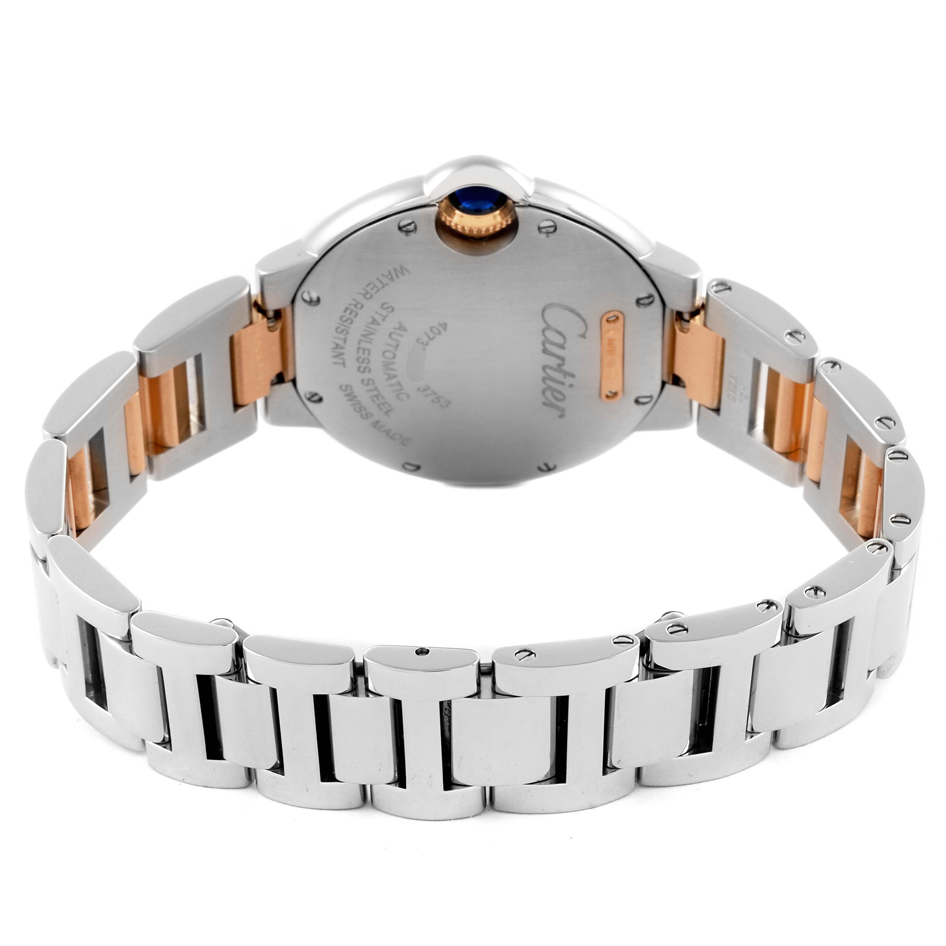 The Cartier Ballon Bleu W2BB0023 Women's Steel and Gold (two tone) Silver Dial W2BB0023 Women's Steel and Gold (two tone) Silver Dial watch is shown from the back, highlighting its stainless steel bracelet and engraved case back.