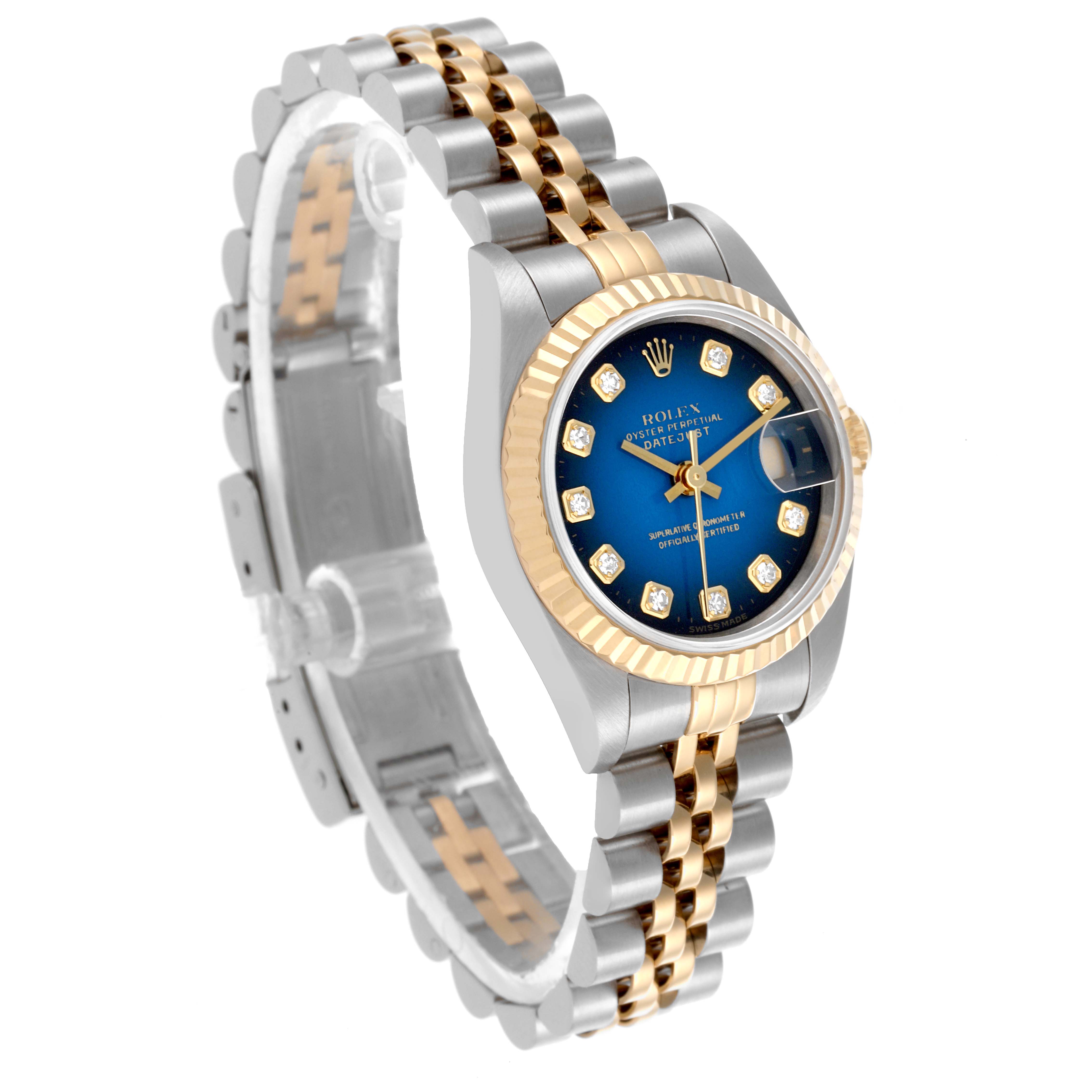 The Rolex Datejust 69173 Women's Steel and Gold (two tone) Blue Dial 69173 Women's Steel and Gold (two tone) Blue Dial watch is shown at a slight angle, highlighting the blue dial, gold bezel, and two-tone bracelet.