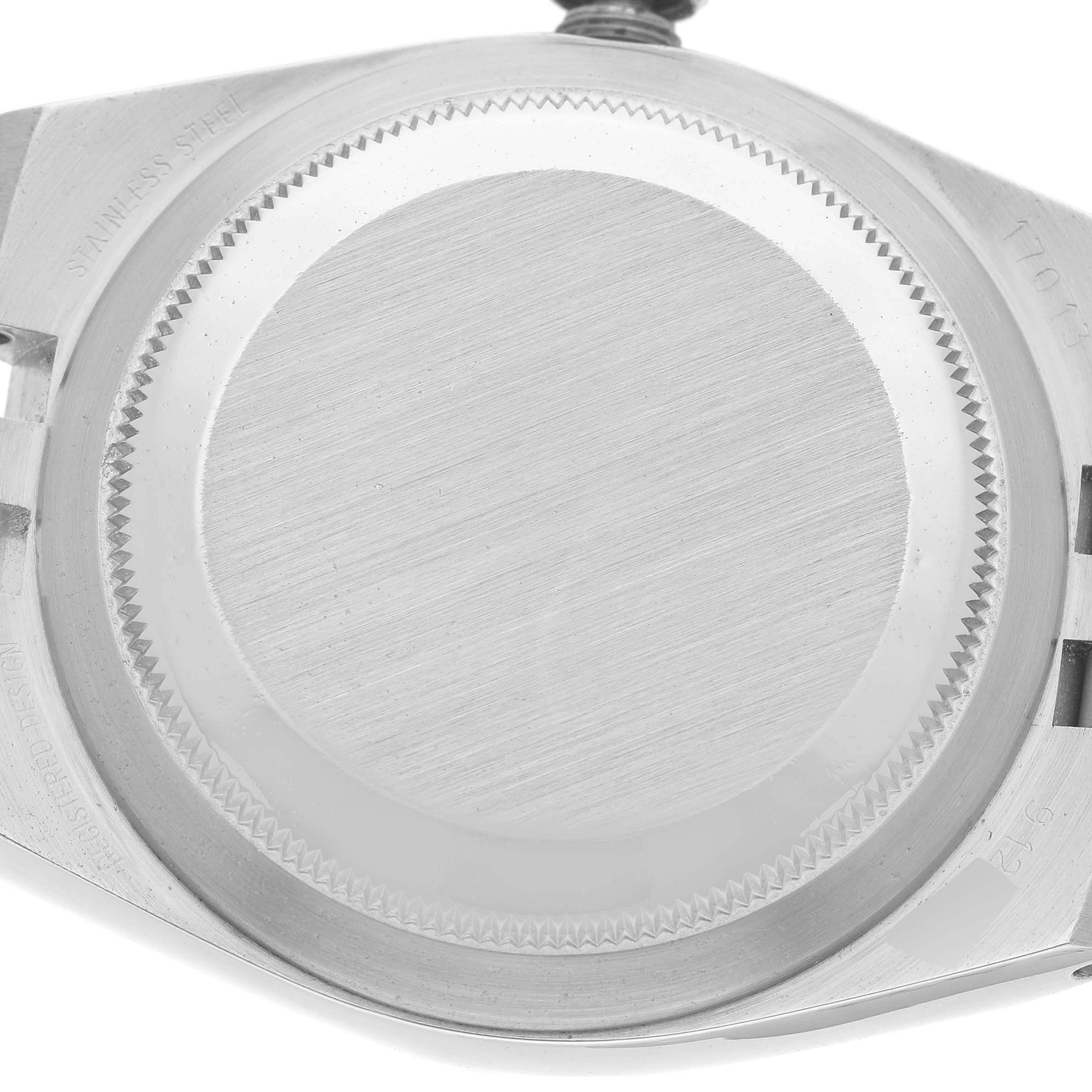 This image shows the case back of a Rolex Oysterquartz 17013 Men's Steel and Gold (two tone) White Dial 17013 Men's Steel and Gold (two tone) White Dial watch, viewed from the back side.