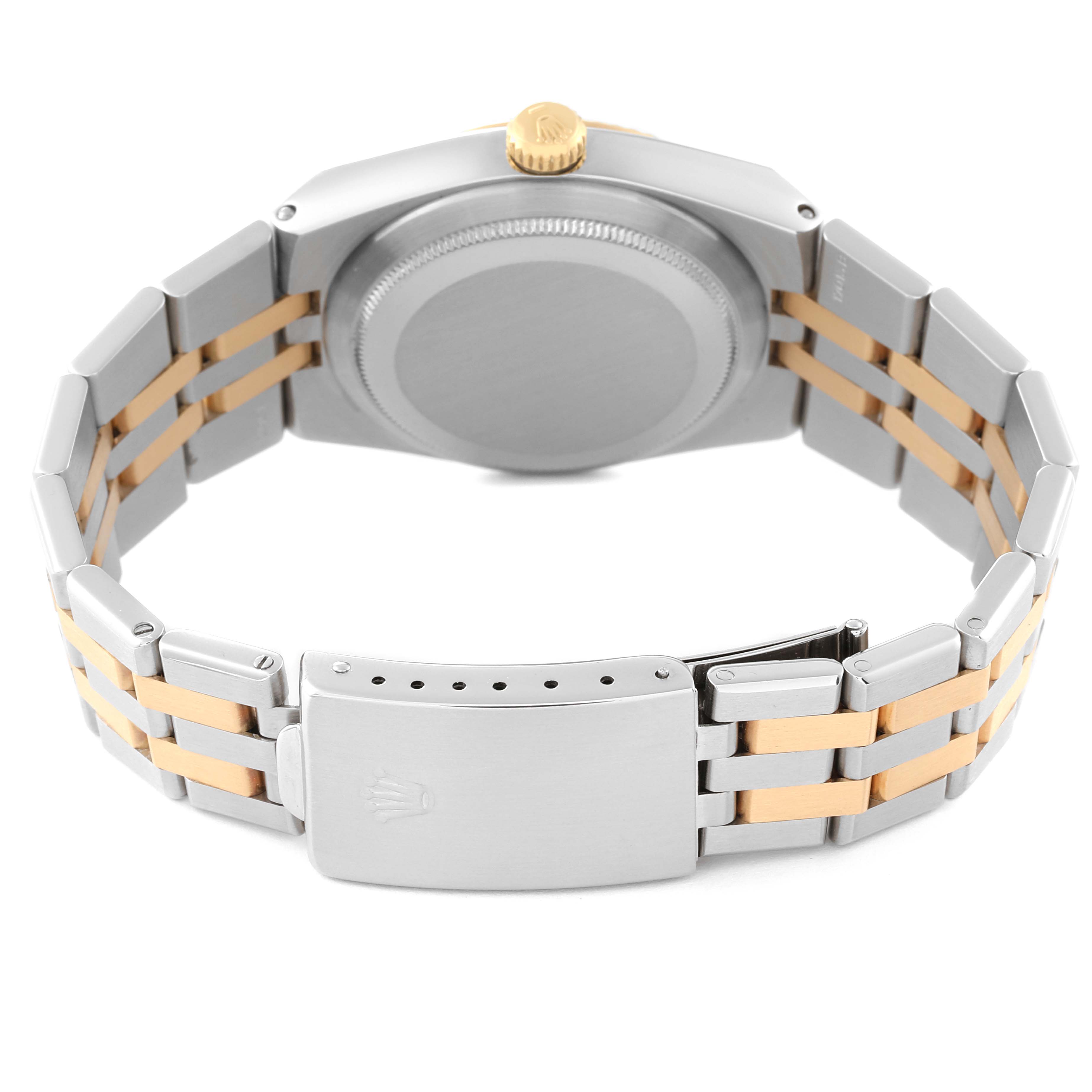 The image shows the back view of the Rolex Oysterquartz 17013 Men's Steel and Gold (two tone) White Dial 17013 Men's Steel and Gold (two tone) White Dial watch, featuring the case back, crown, and bracelet with a two-tone design.
