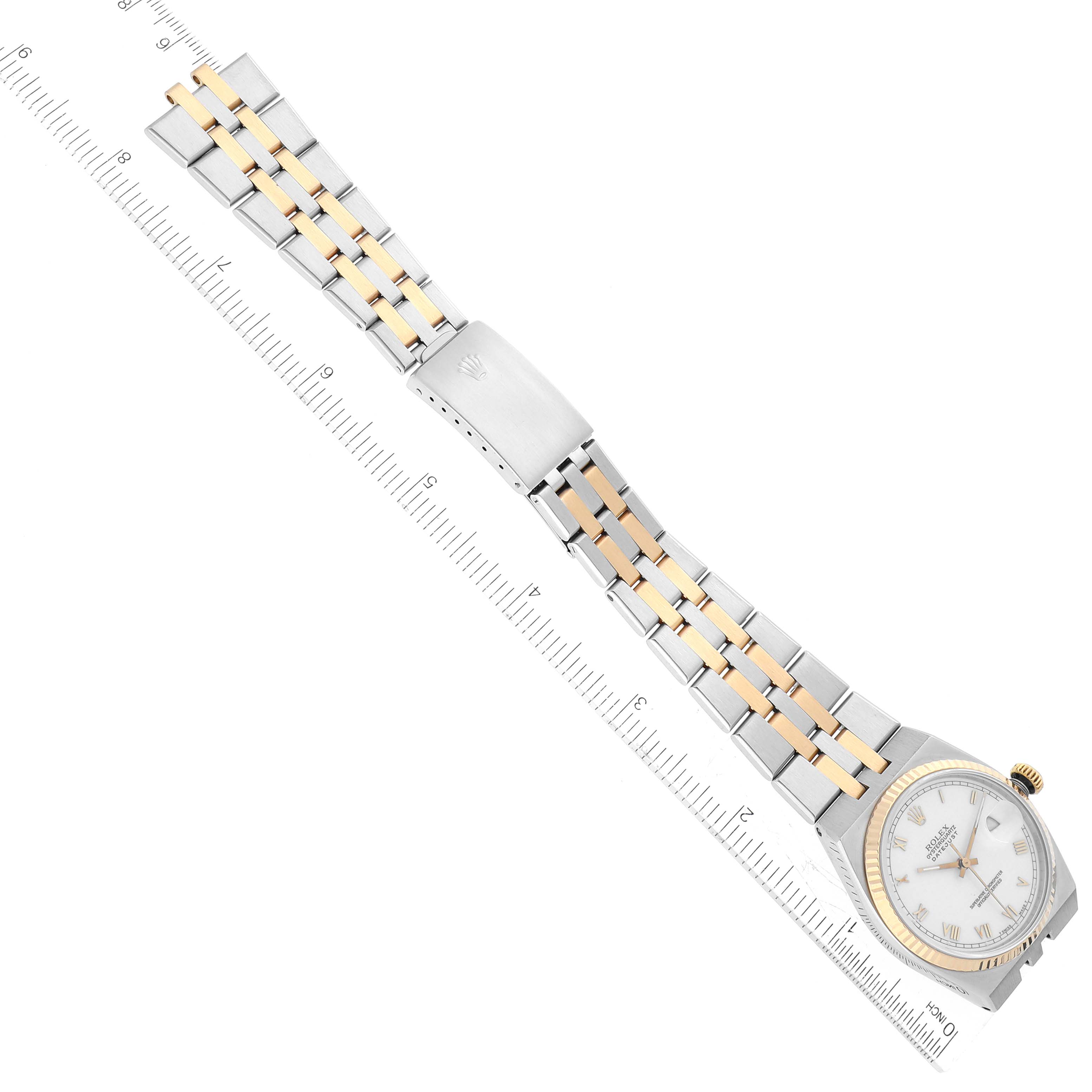 This image shows a top view of the Rolex Oysterquartz 17013 Men's Steel and Gold (two tone) White Dial 17013 Men's Steel and Gold (two tone) White Dial watch, including the face, bezel, and two-tone metal bracelet.