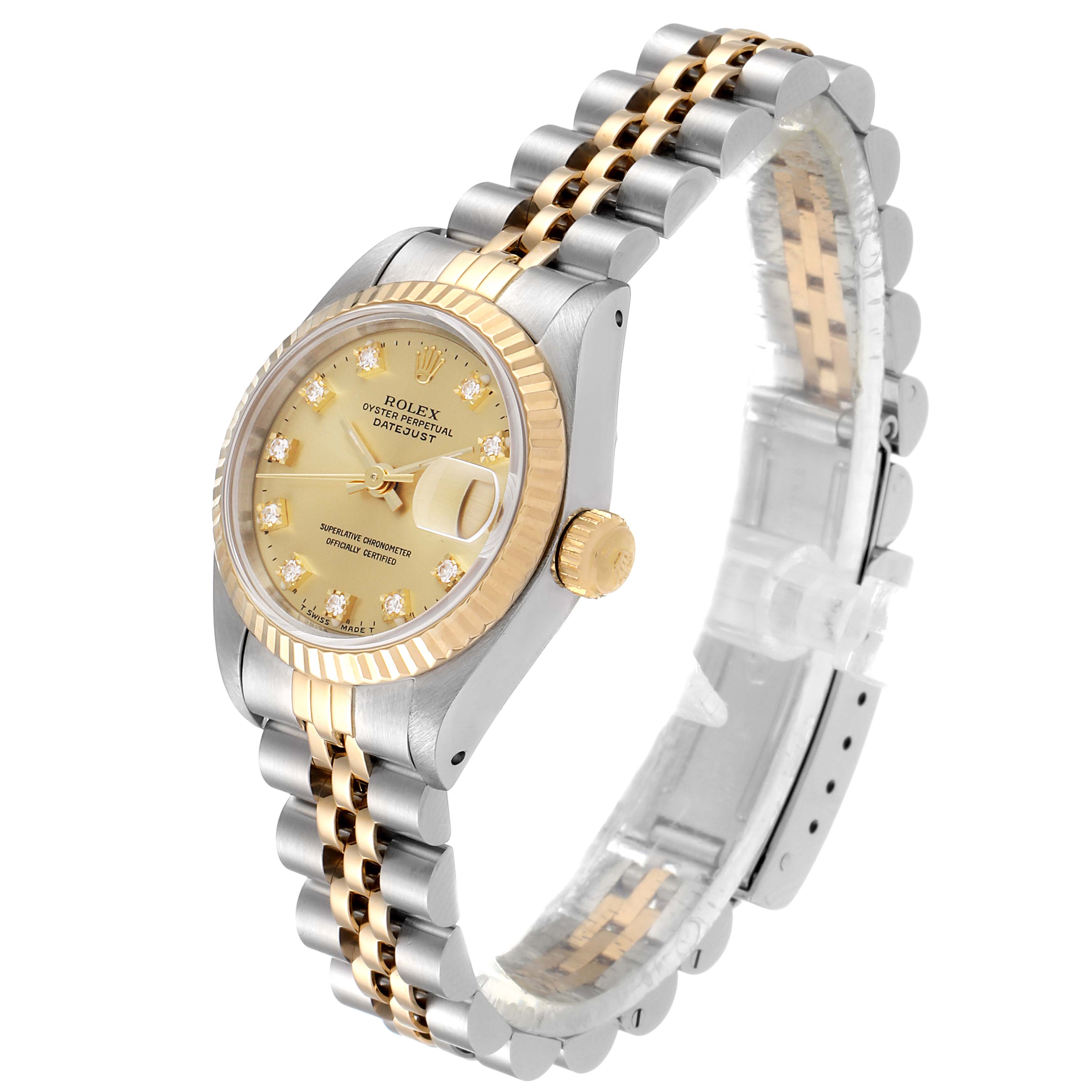 This image shows a Rolex Datejust 69173 Women's Steel and Gold (two tone) Champagne Dial 69173 Women's Steel and Gold (two tone) Champagne Dial watch from a side angle, displaying the dial, bezel, crown, and bracelet.