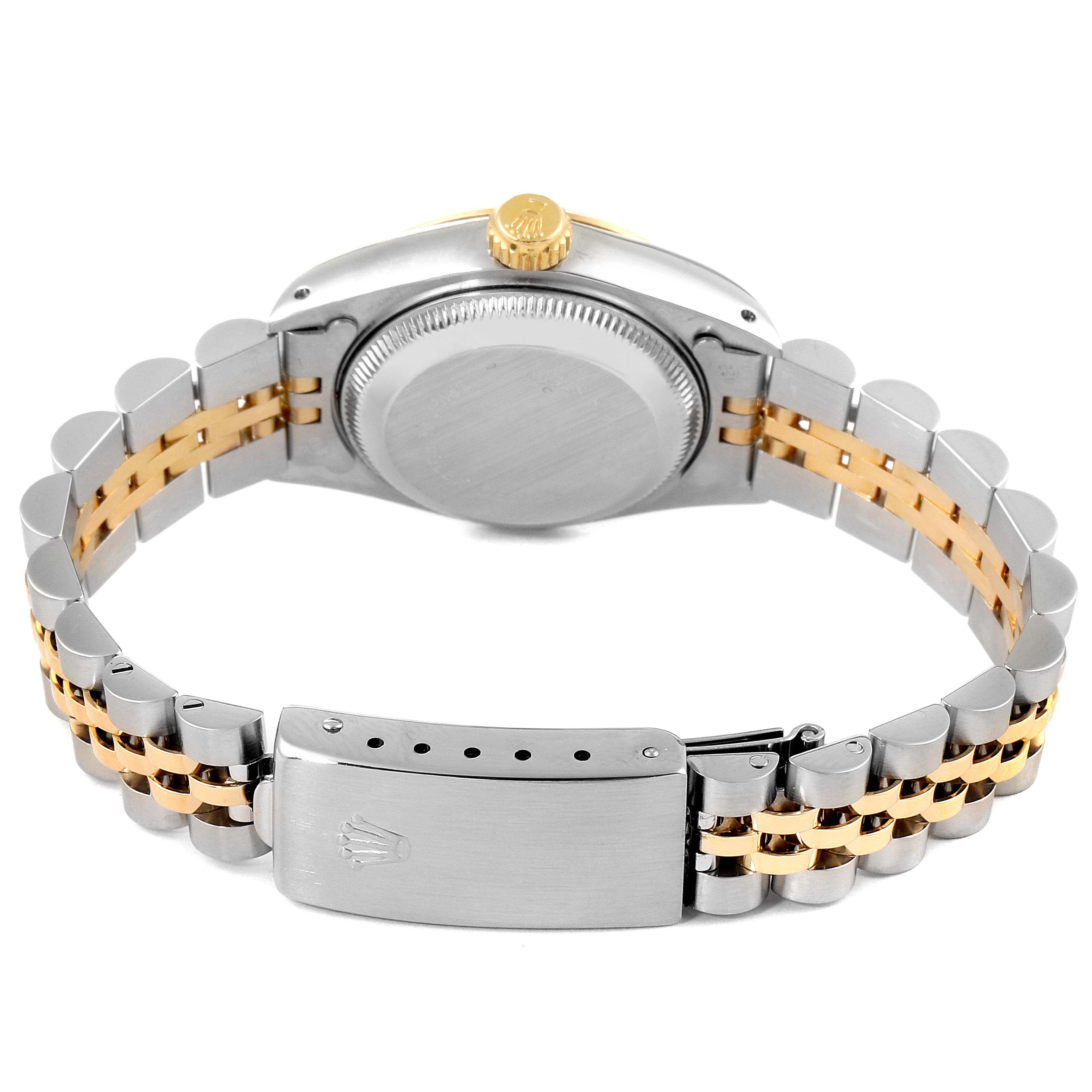 The image shows the back view of a Rolex Datejust 69173 Women's Steel and Gold (two tone) Champagne Dial 69173 Women's Steel and Gold (two tone) Champagne Dial watch, focusing on its stainless steel and gold bracelet and clasp.