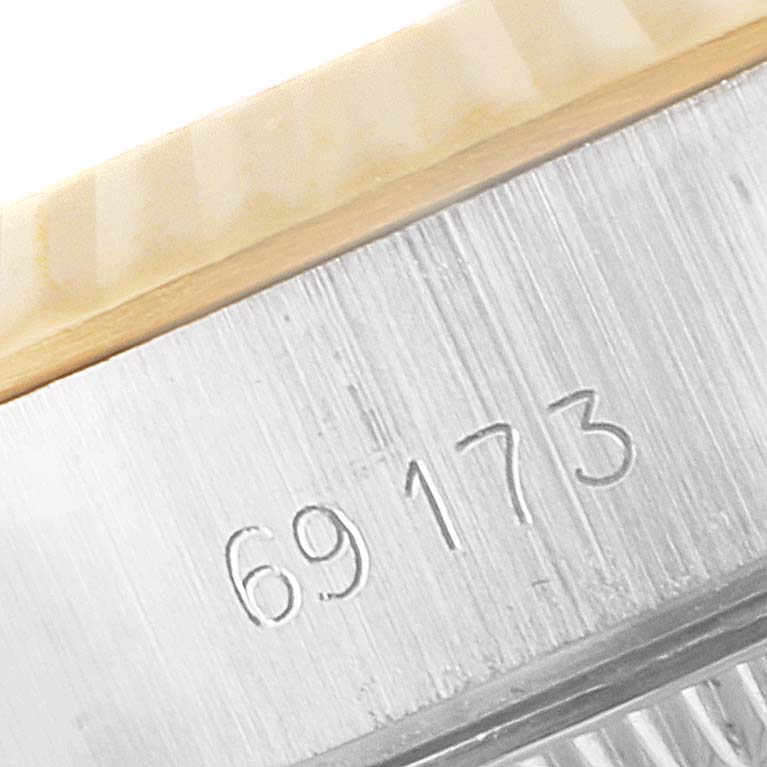 This close-up image shows the model number, 69173, on the case of a Rolex Datejust 69173 Women's Steel and Gold (two tone) Blue Dial 69173 Women's Steel and Gold (two tone) Blue Dial watch.