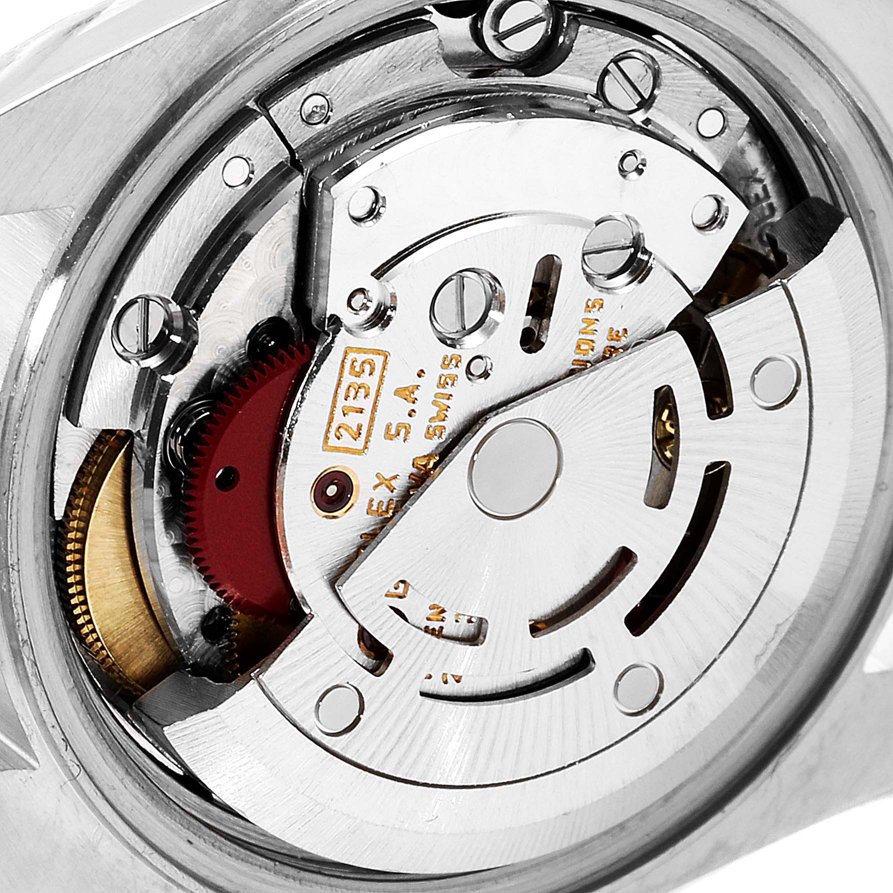 The image shows a close-up view of the movement mechanism inside a Rolex Datejust 69173 Women's Steel and Gold (two tone) Blue Dial 69173 Women's Steel and Gold (two tone) Blue Dial watch, highlighting its intricate components.