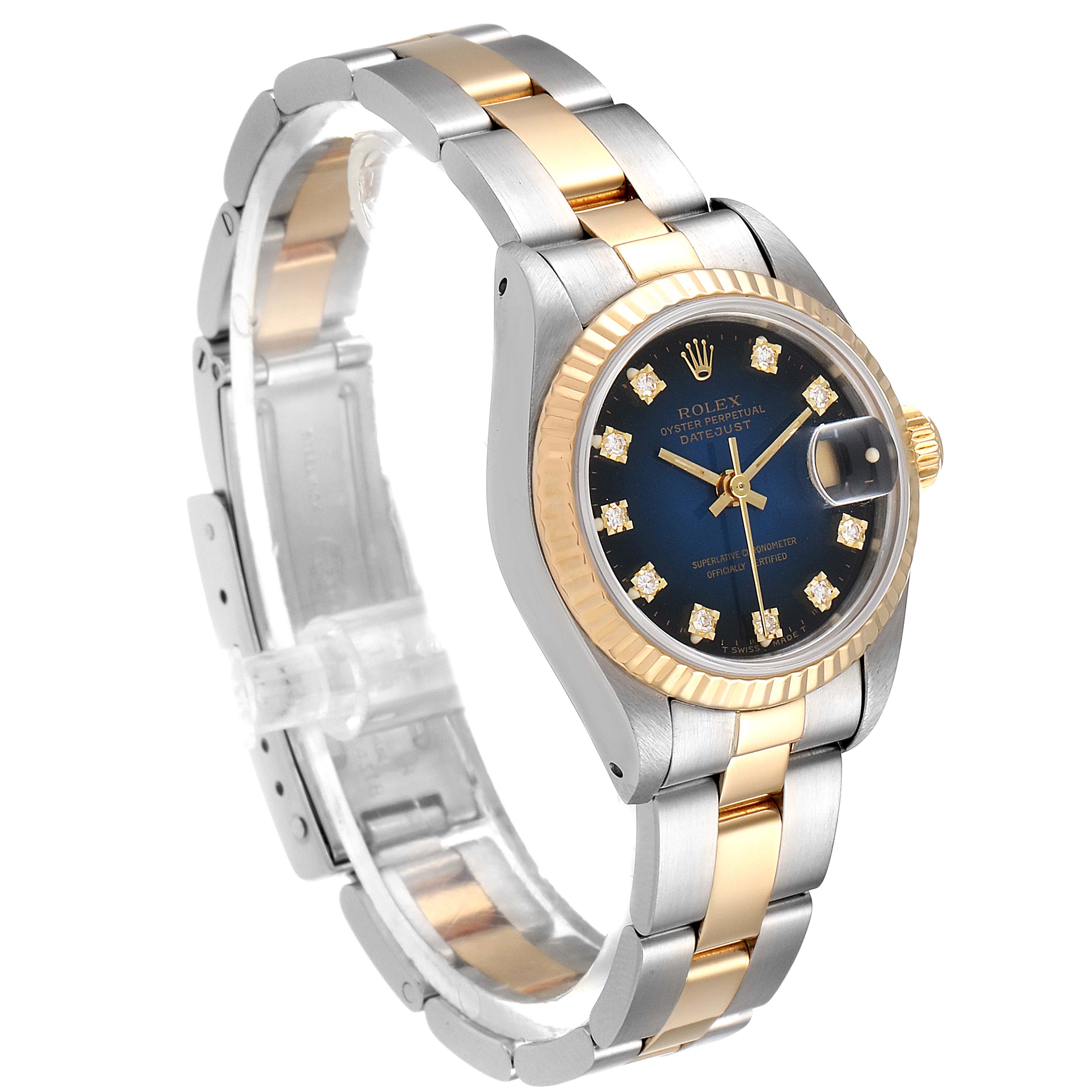 This Rolex Datejust 69173 Women's Steel and Gold (two tone) Blue Dial 69173 Women's Steel and Gold (two tone) Blue Dial watch is shown from a front-side angle, highlighting the blue dial, two-tone bracelet, and fluted bezel.