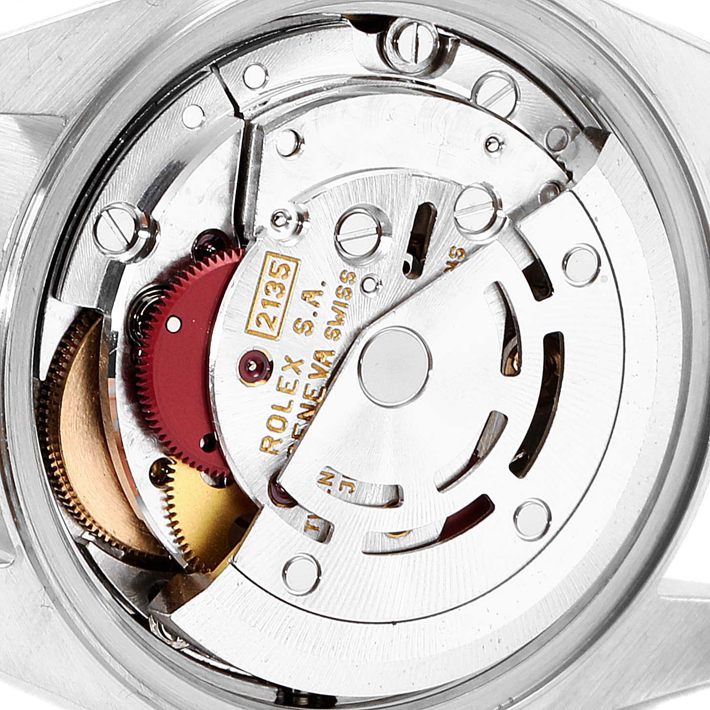 This image shows a close-up view of the internal mechanism of a Rolex Datejust 69173 Women's Steel and Gold (two tone) Champagne Dial 69173 Women's Steel and Gold (two tone) Champagne Dial watch, highlighting its movement components.