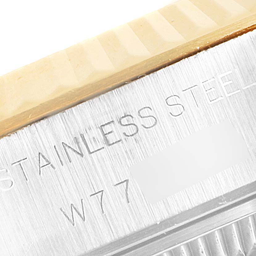 This close-up image shows the stainless steel and partial bezel of a Rolex Datejust 69173 Women's Steel and Gold (two tone) Champagne Dial 69173 Women's Steel and Gold (two tone) Champagne Dial watch.