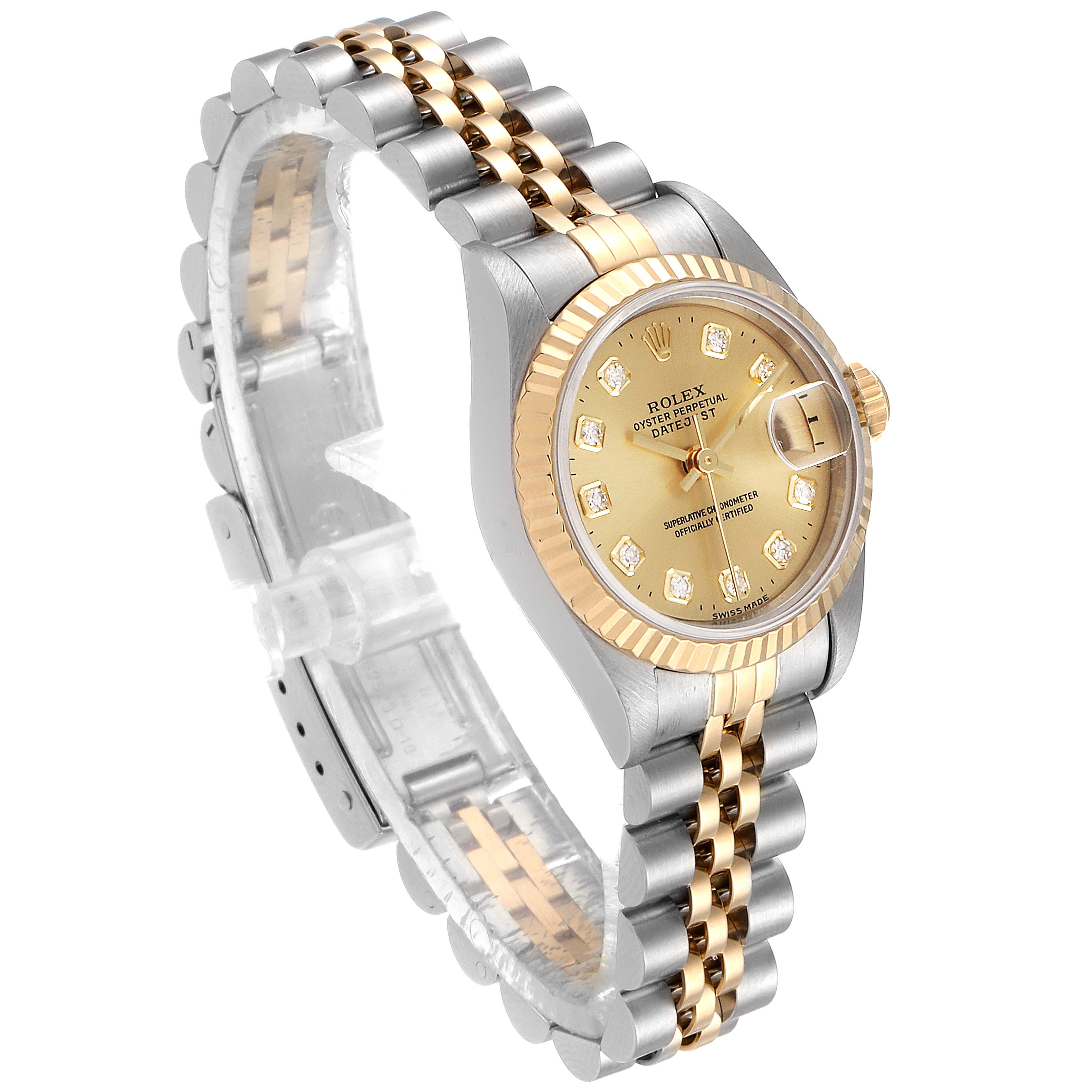 The image shows a Rolex Datejust 69173 Women's Steel and Gold (two tone) Champagne Dial 69173 Women's Steel and Gold (two tone) Champagne Dial watch at a three-quarter angle, highlighting its gold and silver bracelet, bezel, and diamanté dial.