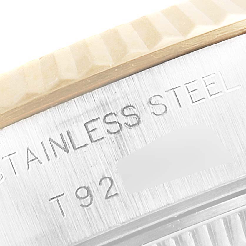 The image shows a close-up view of the stainless steel back and edge of a Rolex Datejust 69173 Women's Steel and Gold (two tone) Champagne Dial 69173 Women's Steel and Gold (two tone) Champagne Dial.