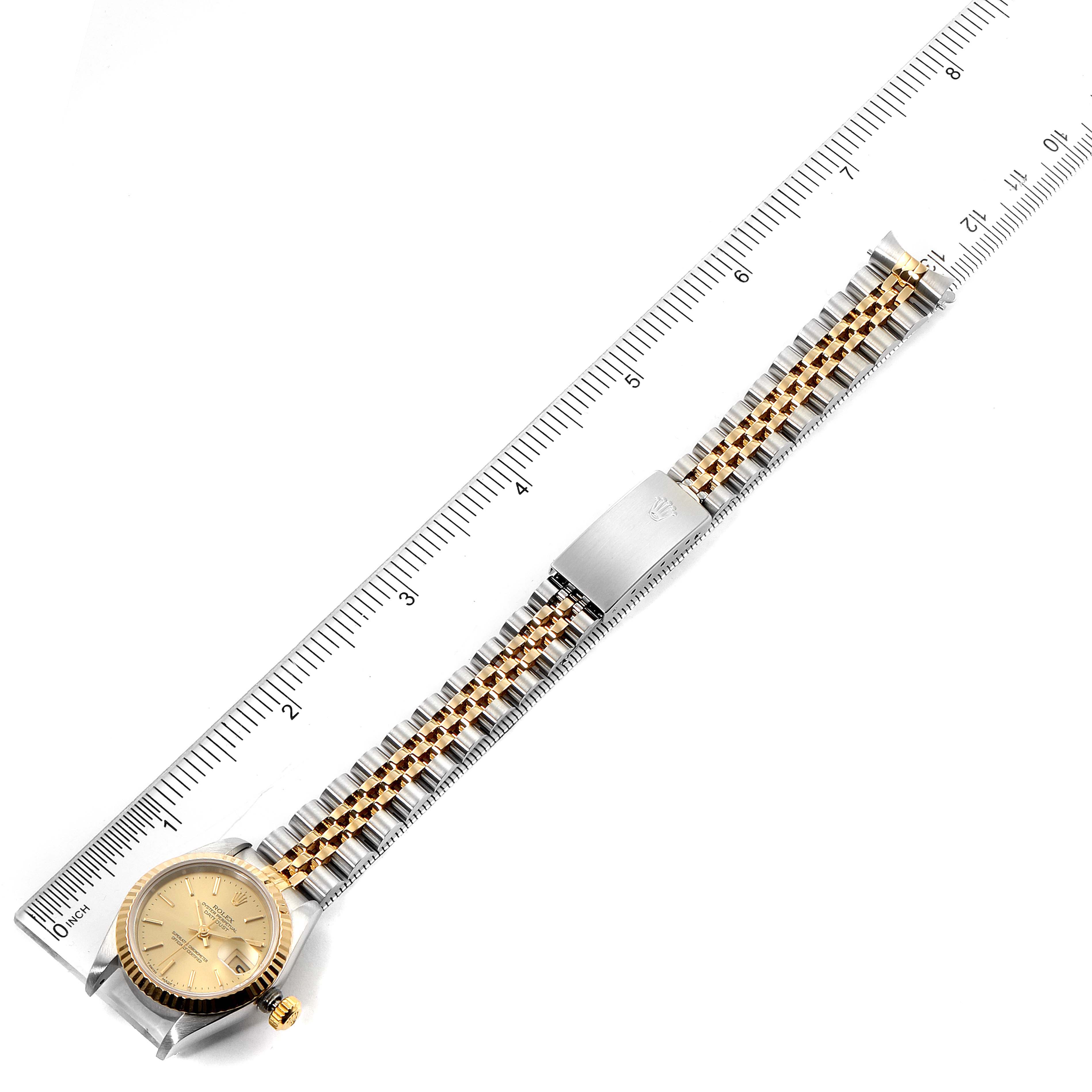 The image shows a top-down view of a Rolex Datejust 69173 Women's Steel and Gold (two tone) Champagne Dial 69173 Women's Steel and Gold (two tone) Champagne Dial watch, displaying the watch face, bracelet, and clasp.