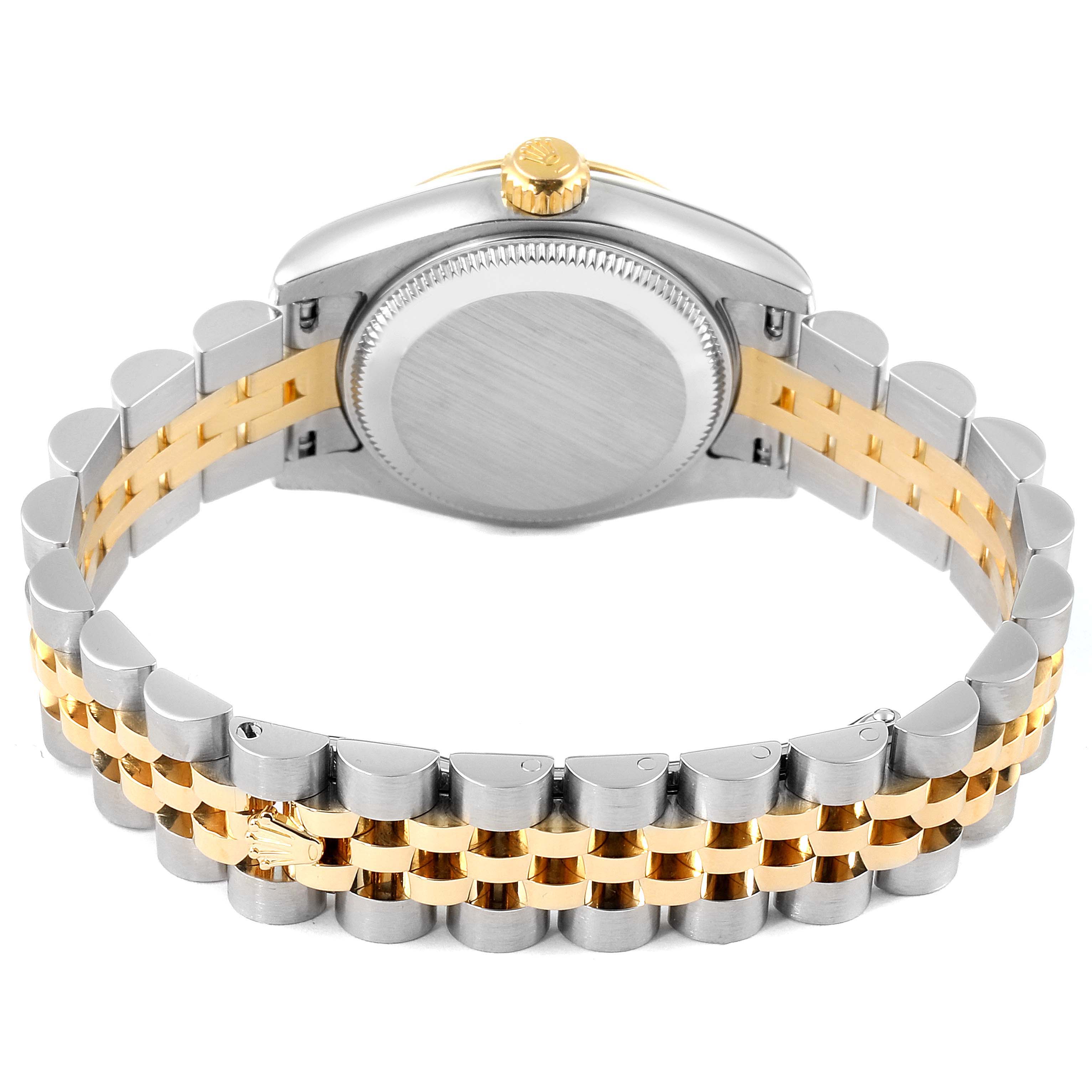 The image shows the back of a Rolex Datejust 179173 Women's Steel and Gold (two tone) Mother of Pearl Dial 179173 Women's Steel and Gold (two tone) Mother of Pearl Dial watch, highlighting its case back and two-tone bracelet.