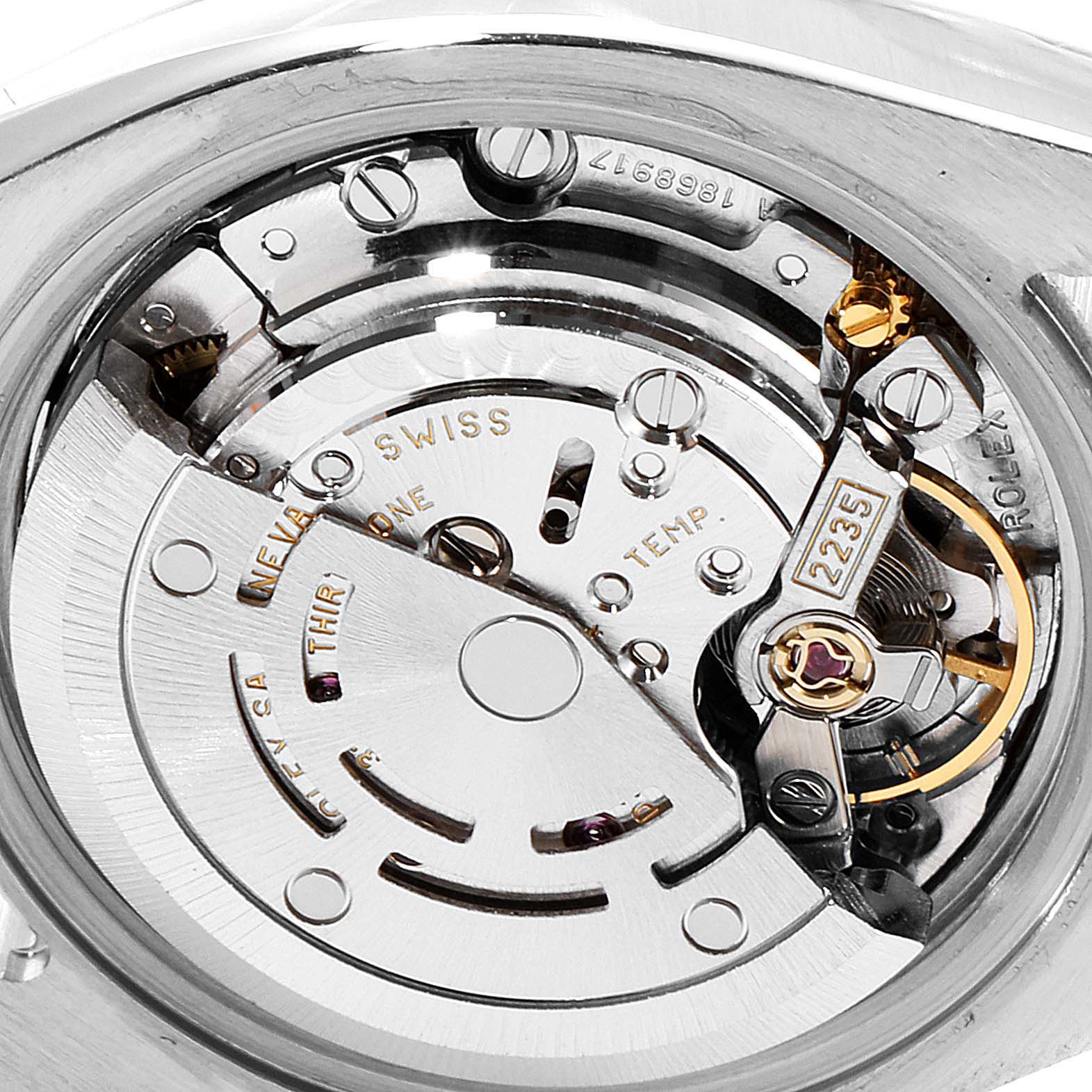 This image shows a close-up view of the movement inside a Rolex Datejust 179173 Women's Steel and Gold (two tone) Mother of Pearl Dial 179173 Women's Steel and Gold (two tone) Mother of Pearl Dial watch.