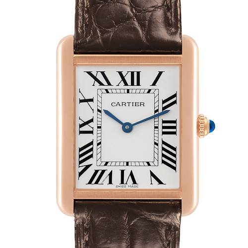 The Cartier Tank Solo W5200025 Men's Steel and Gold (two tone) Silver Dial W5200025 Men's Steel and Gold (two tone) Silver Dial watch is shown from a front angle, highlighting the face, Roman numerals, and crown with a blue gem.