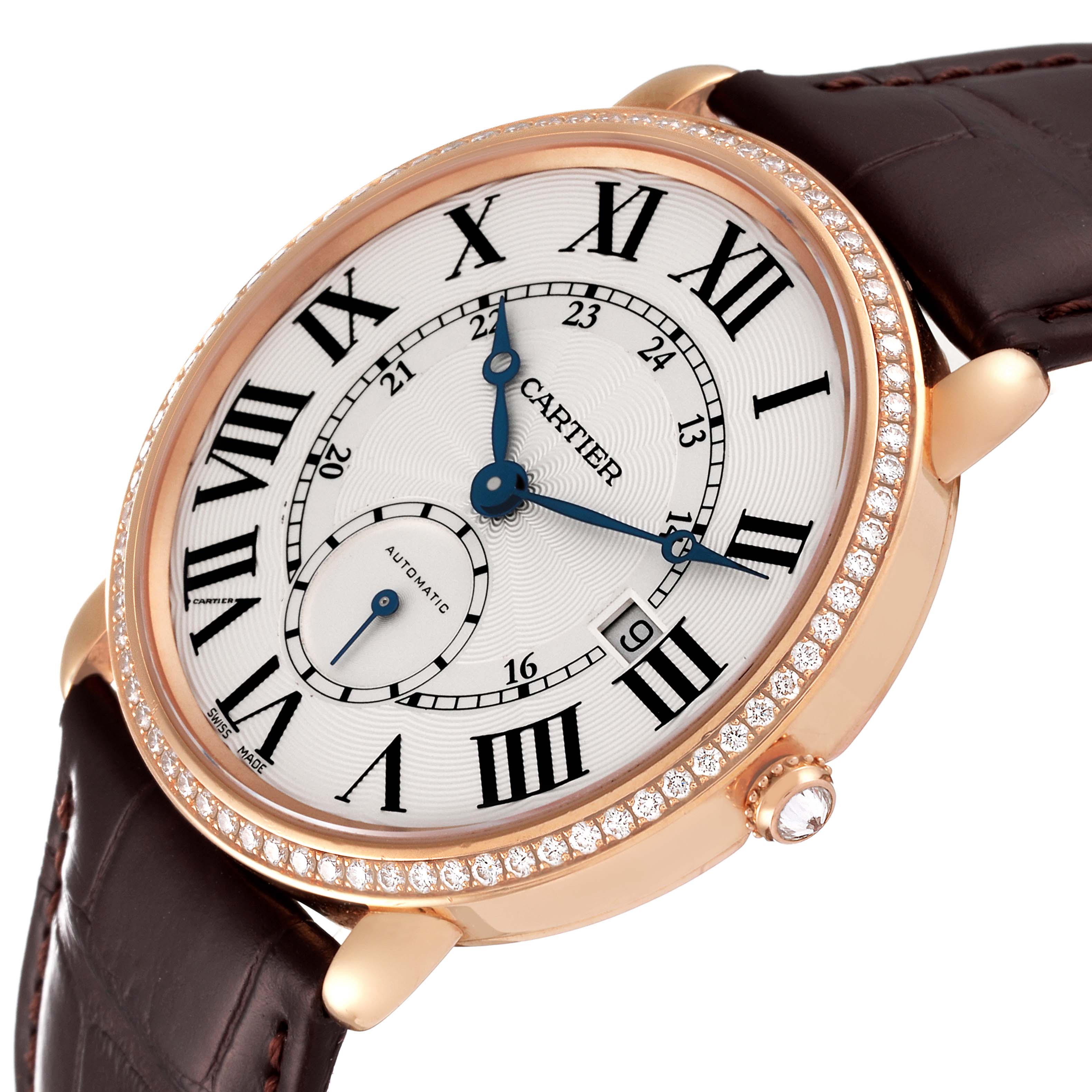 The image shows a close-up, tilted angle of a Cartier Ronde WR007017 Men's Rose Gold Silver Dial WR007017 Men's Rose Gold Silver Dial watch, highlighting its face, bezel, crown, and leather strap.