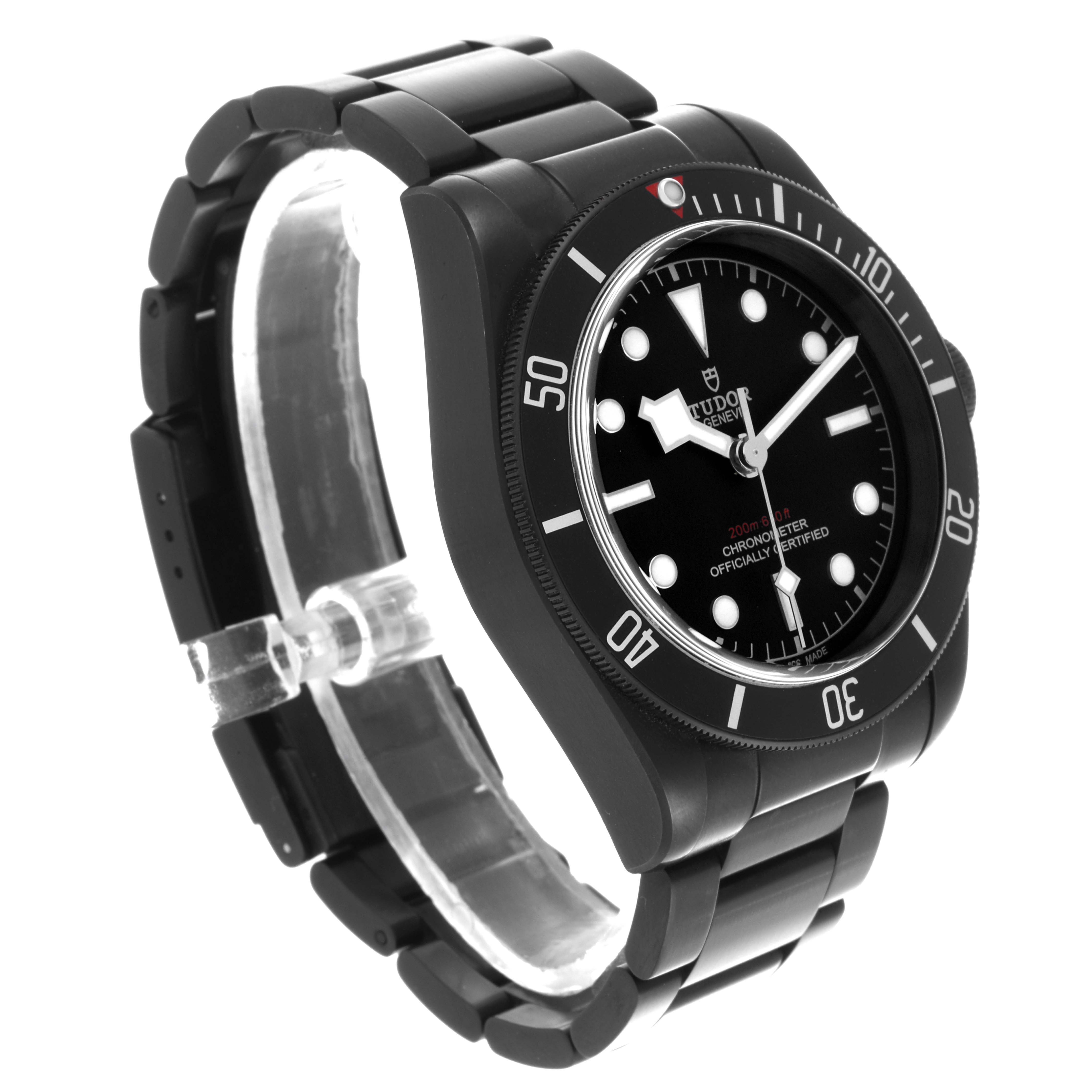 The image shows the Tudor Heritage Black Bay 79230DK Men's Stainless Steel Black Dial 79230DK Men's Stainless Steel Black Dial watch from a front-left angle, highlighting the dial, bezel, and bracelet.