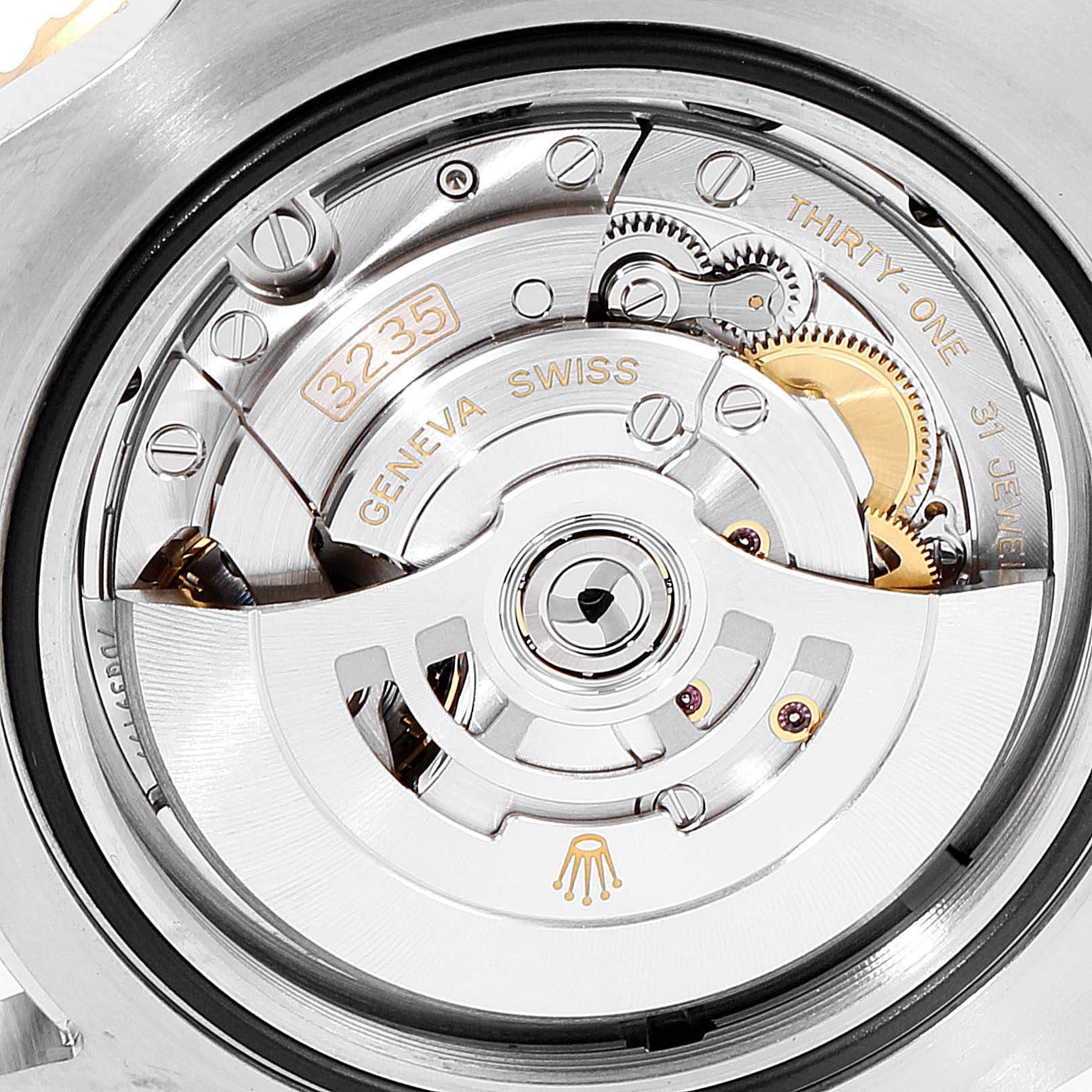 This image shows a close-up view of the movement mechanism inside a Rolex Sea-Dweller 126603 Men's Steel and Gold (two tone) Black Dial 126603 Men's Steel and Gold (two tone) Black Dial, featuring the caliber 3235.