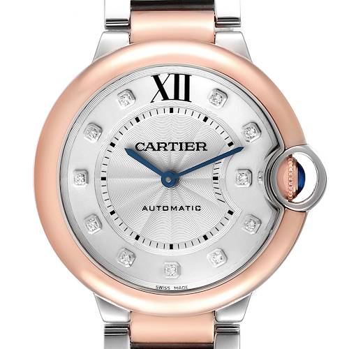 The image shows a close-up of the Cartier Ballon Bleu W3BB0013 Men's Steel and Gold (two tone) Silver Dial W3BB0013 Men's Steel and Gold (two tone) Silver Dial watch face, highlighting the dial, hands, and bezel details.