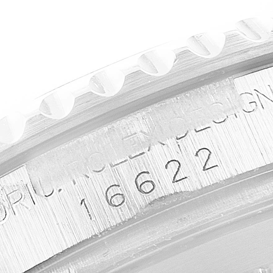 This close-up image shows the bezel and engraved serial number part of a Rolex Yacht-Master 16622 Men's Stainless Steel Silver Dial 16622 Men's Stainless Steel Silver Dial watch.