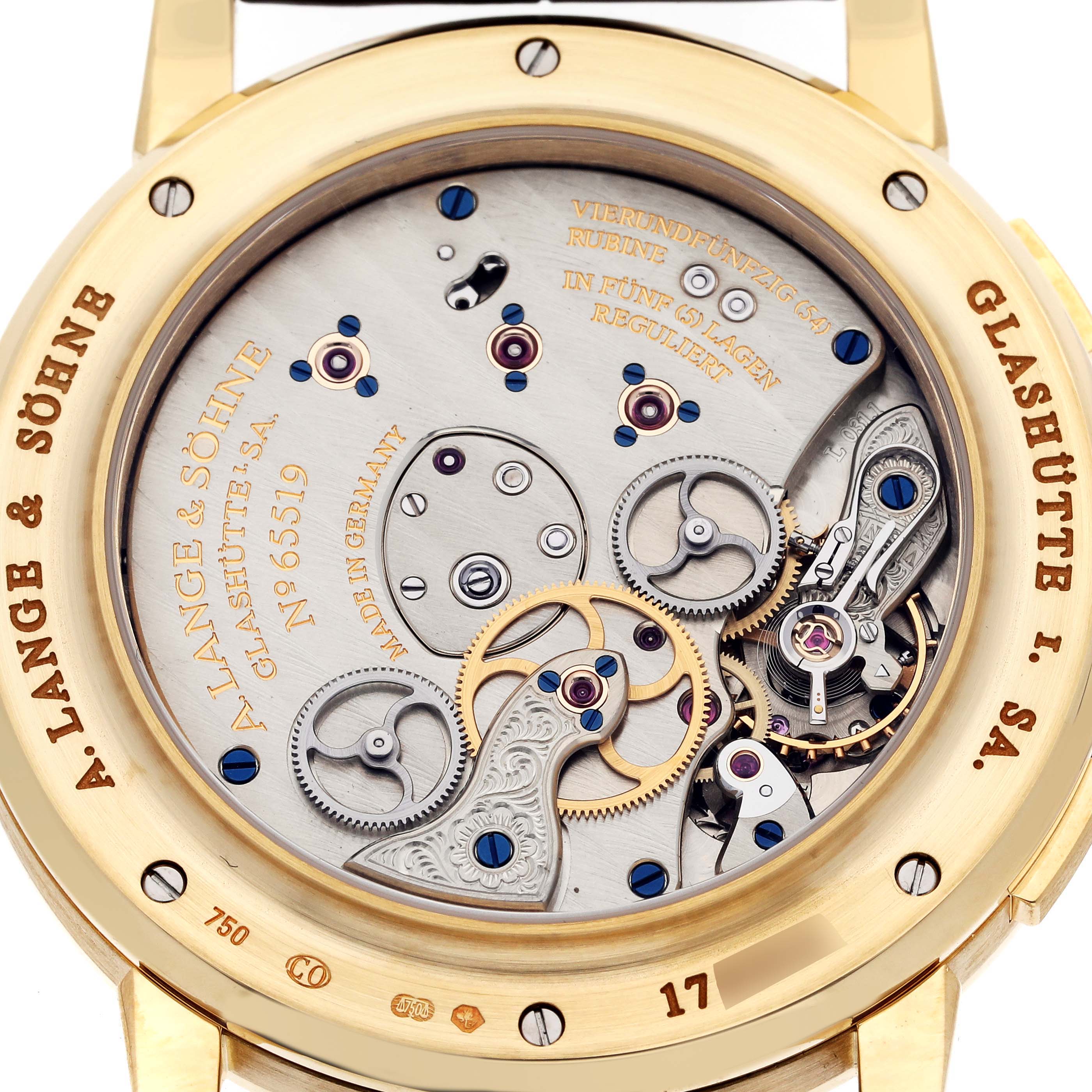 The image shows the detailed back view of the A. Lange & Sohne Lange 1 116.021 Men's Yellow Gold Silver Dial watch, highlighting its intricate movement and gears.