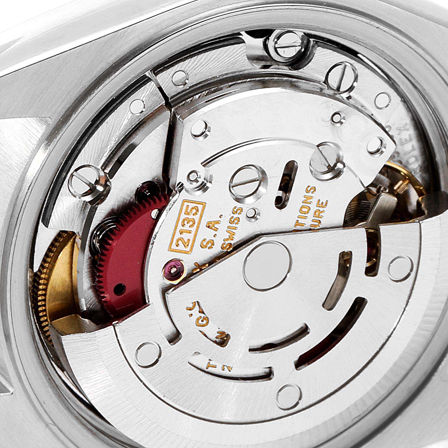 This is a close-up image of the movement of a Rolex Datejust 69173 Women's Steel and Gold (two tone) Champagne Dial 69173 Women's Steel and Gold (two tone) Champagne Dial watch, showing intricate internal components.