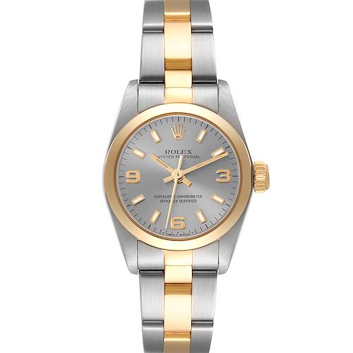 The Rolex Oyster Perpetual 67183 Women's Steel and Gold (two tone) Grey Dial 67183 Women's Steel and Gold (two tone) Grey Dial watch is shown from a top-down angle, displaying its gold and silver dial and bracelet.