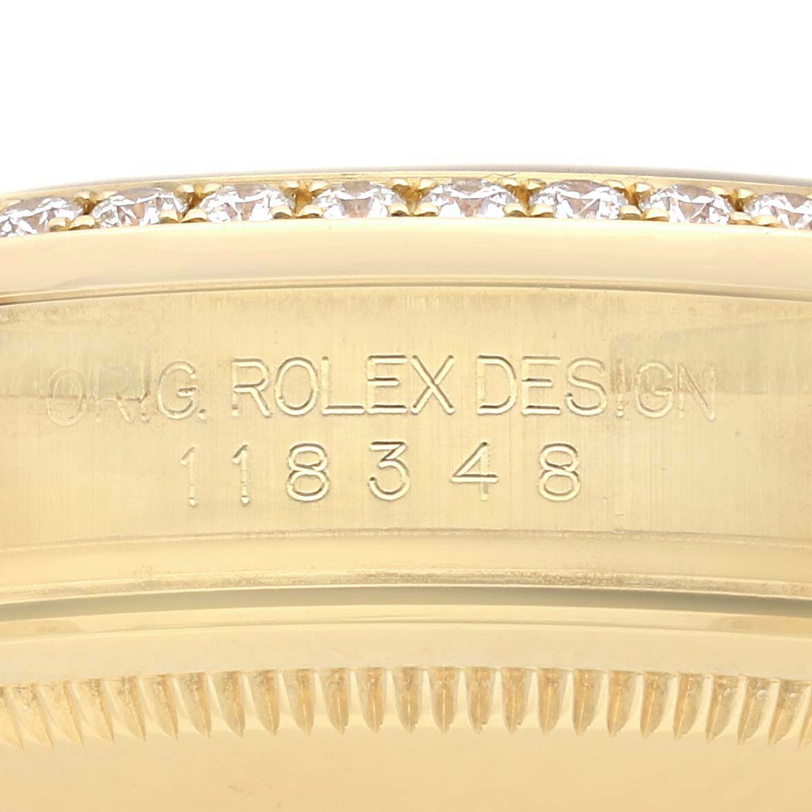 The image shows the side of the Rolex President 118348 Men's Yellow Gold Champagne Dial 118348 Men's Yellow Gold Champagne Dial watch case, highlighting the model number and diamond-set bezel.