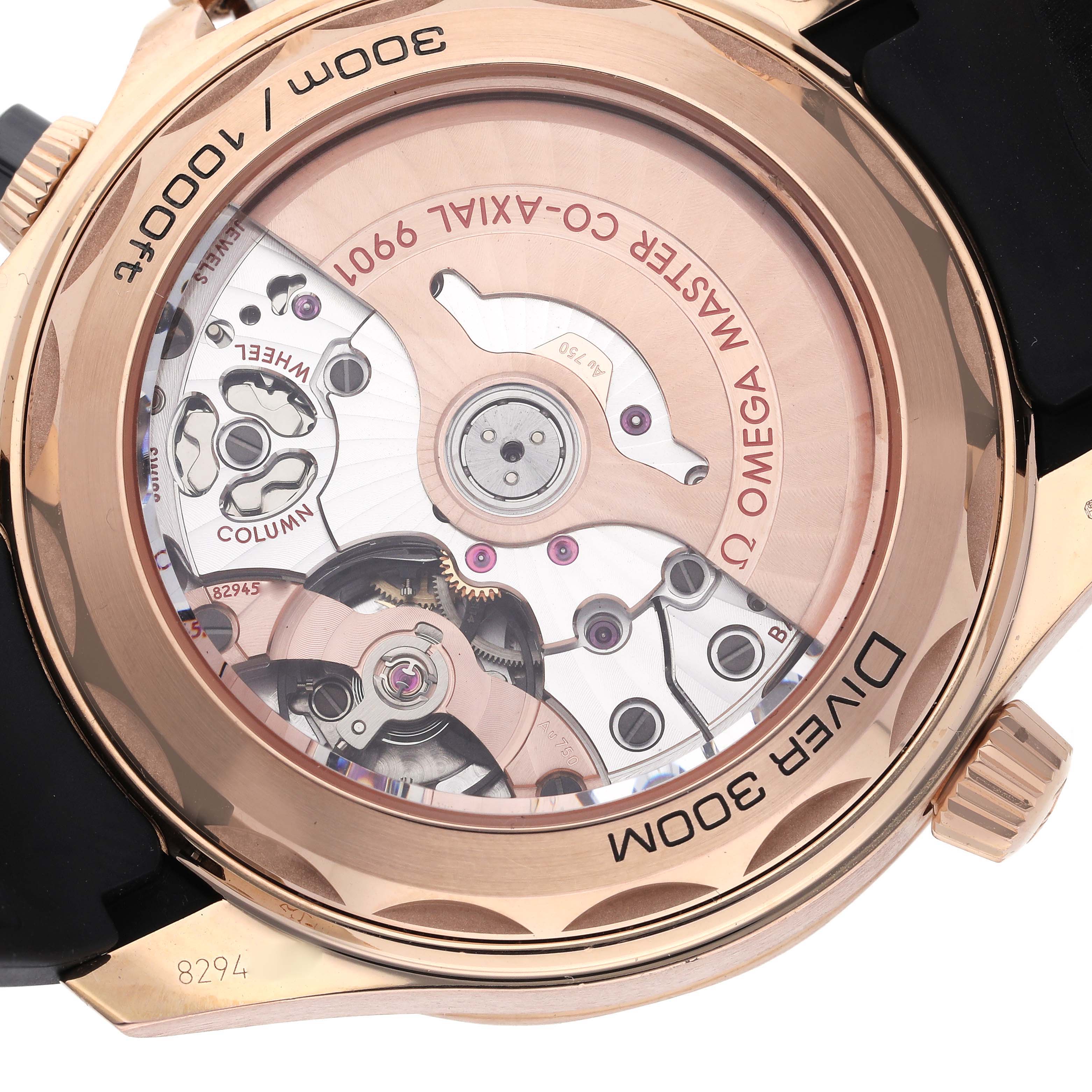 The image shows the back view of an Omega Seamaster 210.62.44.51.01.001 Men's Rose Gold Black Dial 210.62.44.51.01.001 Men's Rose Gold Black Dial dive watch, highlighting the movement and rotor.