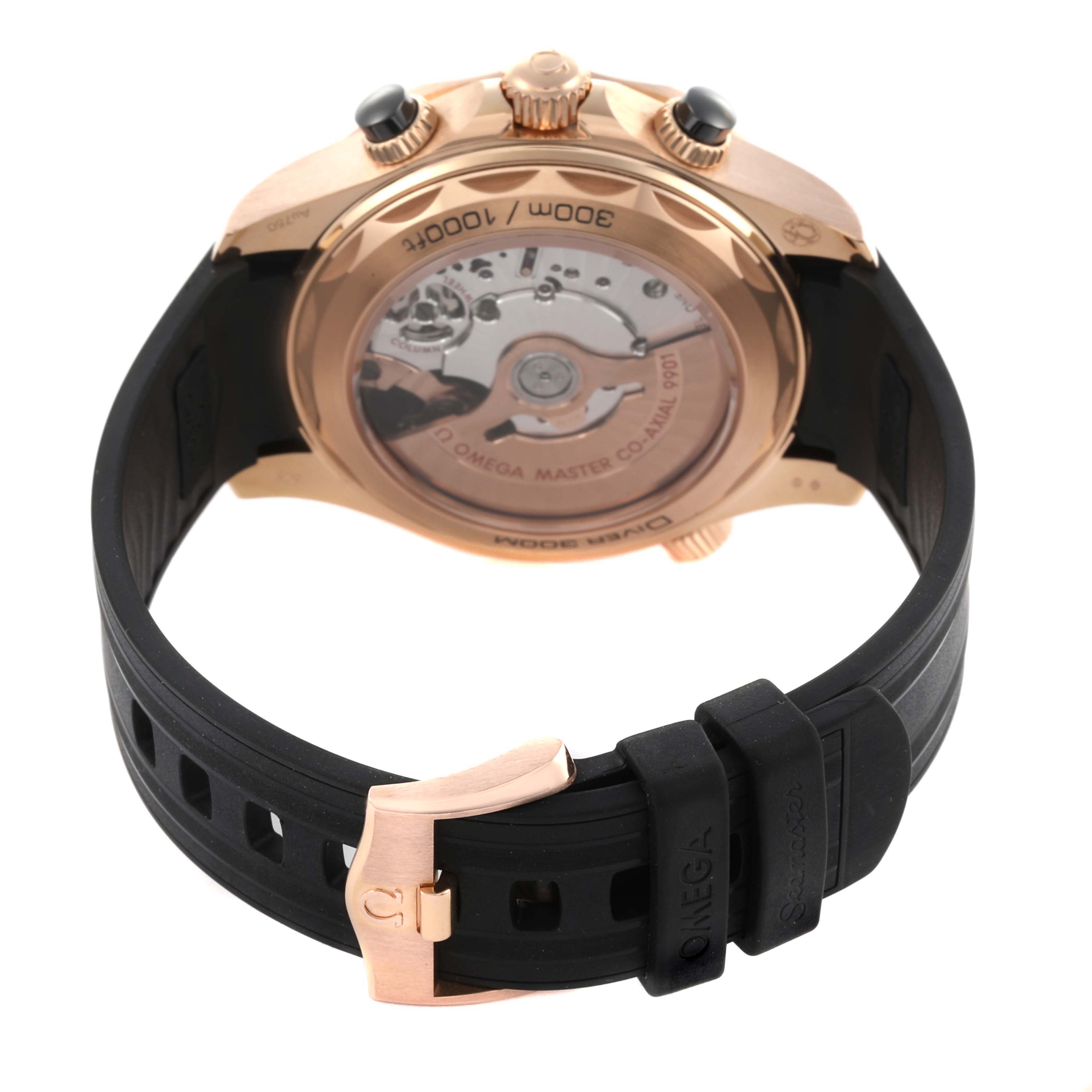 The image shows the back view of an Omega Seamaster 210.62.44.51.01.001 Men's Rose Gold Black Dial 210.62.44.51.01.001 Men's Rose Gold Black Dial watch, highlighting the case back, movement, and black strap with buckle.