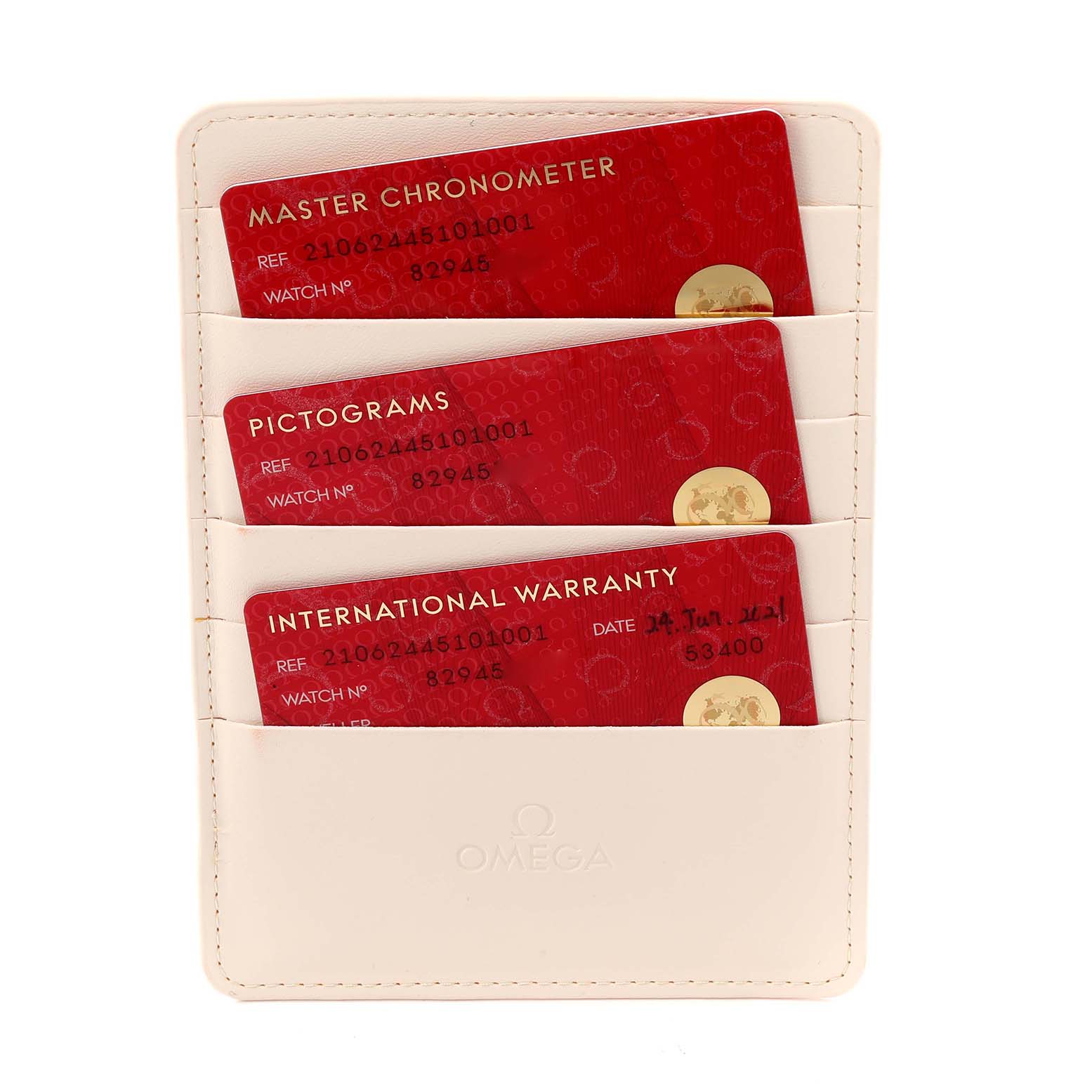 The image shows the warranty and chronometer cards for the Omega Seamaster 210.62.44.51.01.001 Men's Rose Gold Black Dial 210.62.44.51.01.001 Men's Rose Gold Black Dial, displayed in a cream cardholder.