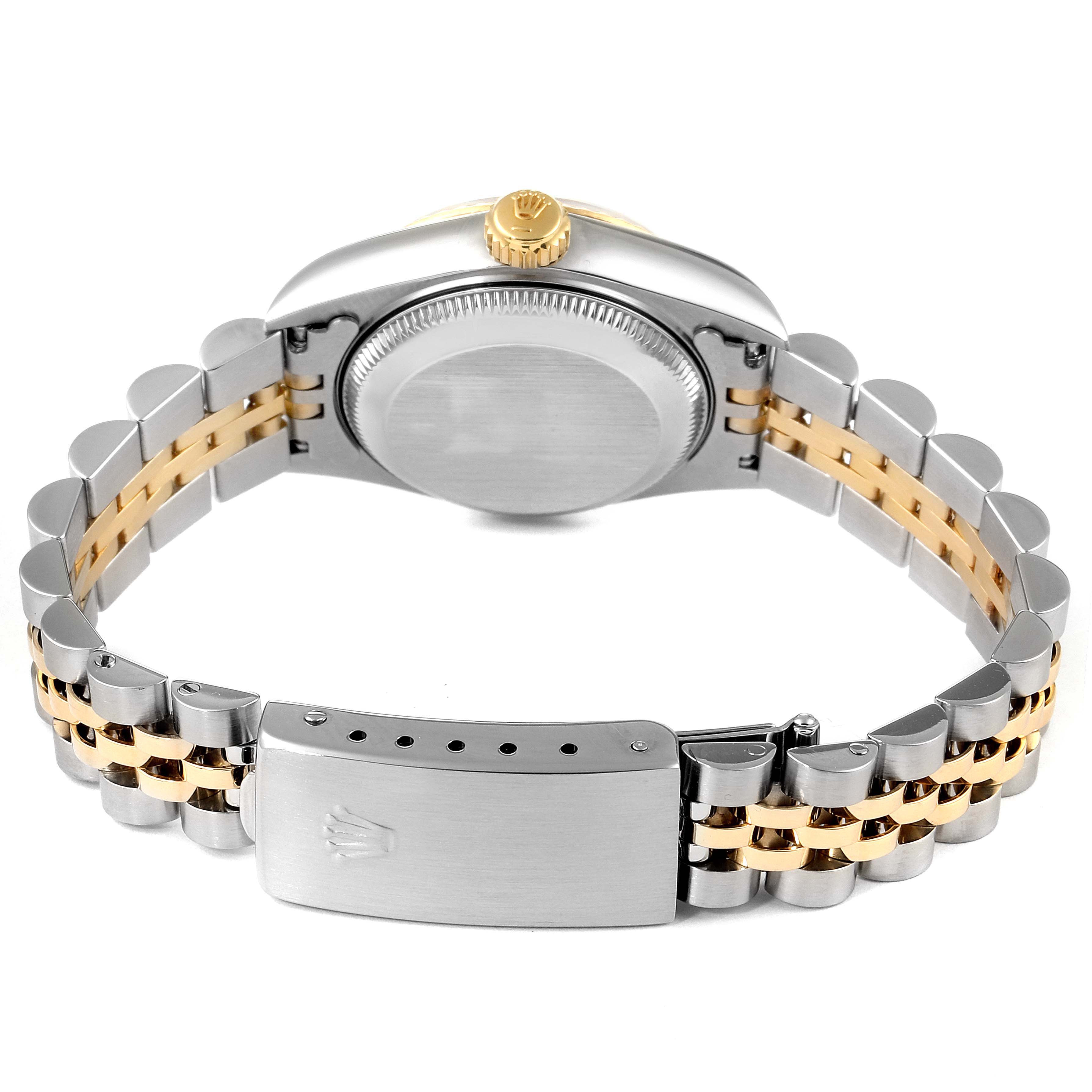 This image shows the back case, crown, and two-tone bracelet of the Rolex Datejust 69173 Women's Steel and Gold (two tone) Champagne Dial 69173 Women's Steel and Gold (two tone) Champagne Dial watch.