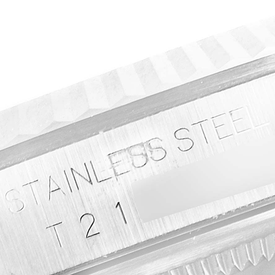 This close-up image shows the bezel and part of the case of a Rolex Datejust 16234 Men's Stainless Steel Mother of Pearl Dial 16234 Men's Stainless Steel Mother of Pearl Dial stainless steel watch.