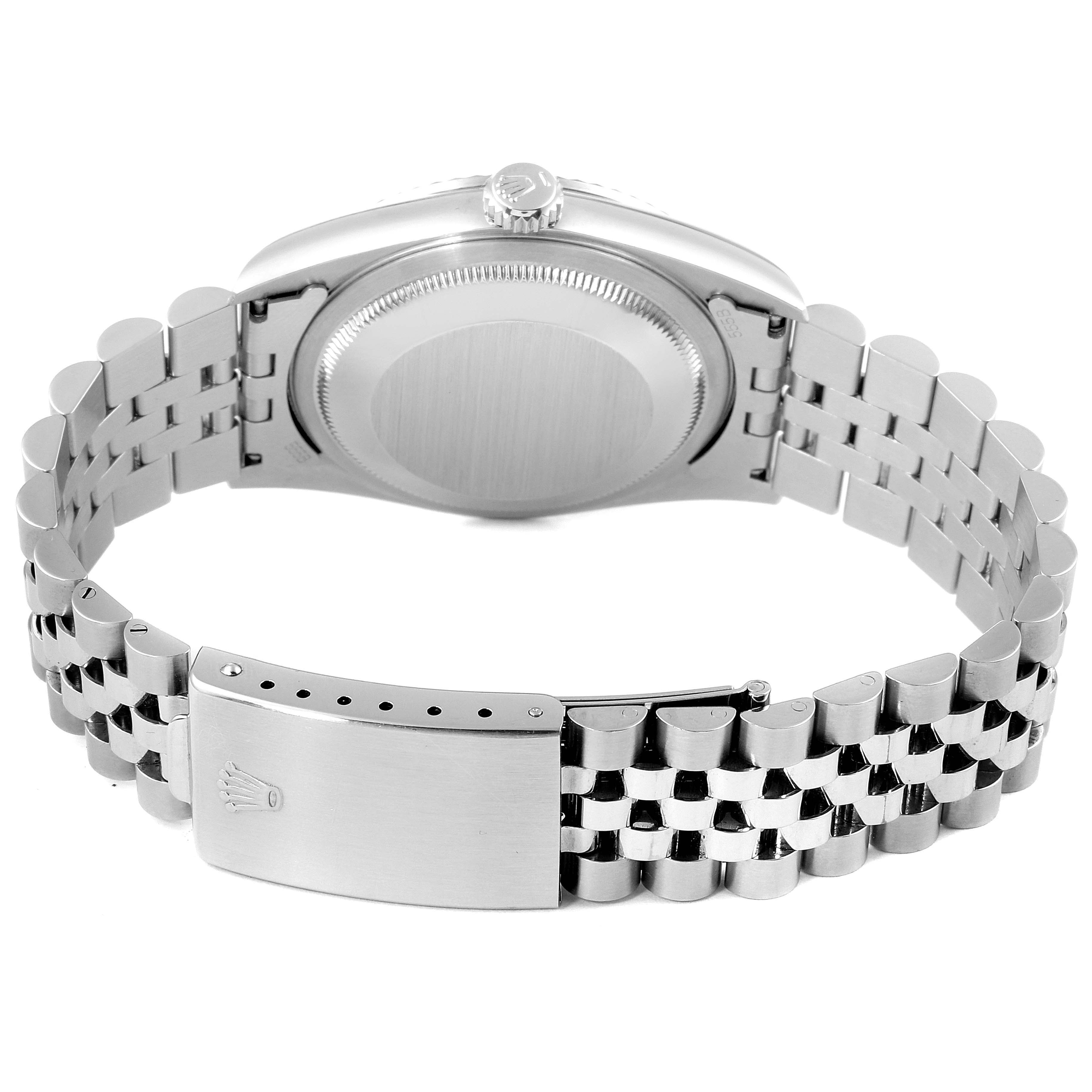 This image shows the back view of a Rolex Datejust 16234 Men's Stainless Steel Mother of Pearl Dial 16234 Men's Stainless Steel Mother of Pearl Dial watch, highlighting its case back and bracelet clasp.