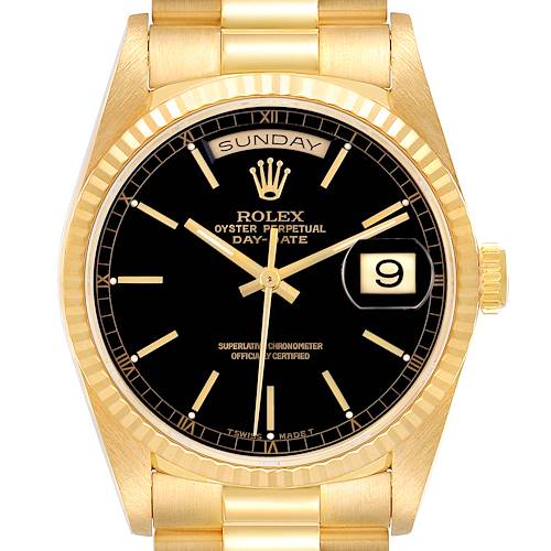 The image shows a front view of the Rolex President 18238 Men's Yellow Gold Black Dial 18238 Men's Yellow Gold Black Dial model, highlighting its gold case, fluted bezel, and black dial.