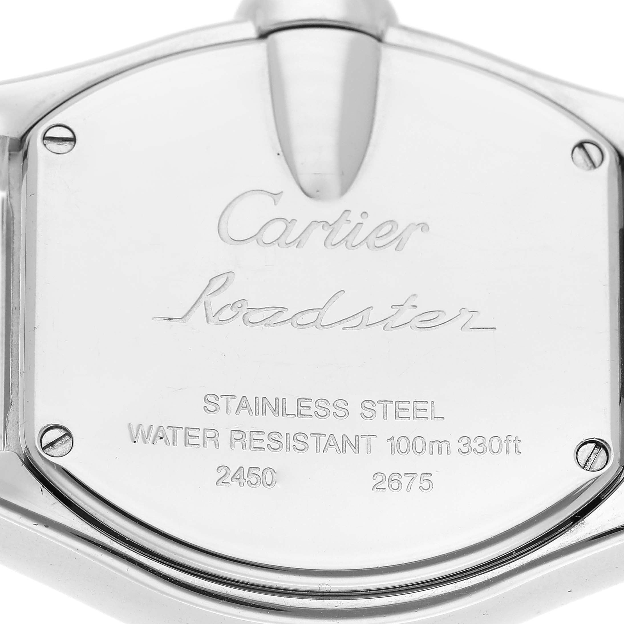 This image shows the back case of a Cartier Roadster W62016V3 Women's Stainless Steel Silver Dial W62016V3 Women's Stainless Steel Silver Dial watch, displaying engravings and screws.
