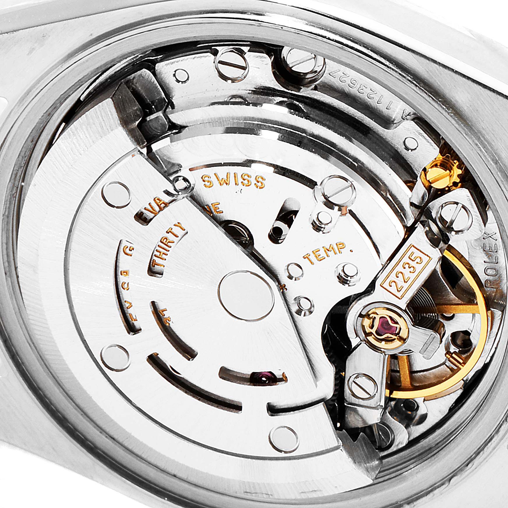 This image shows a close-up view of the movement mechanism of the Rolex Datejust 79174 Women's Stainless Steel Pink Dial 79174 Women's Stainless Steel Pink Dial watch.