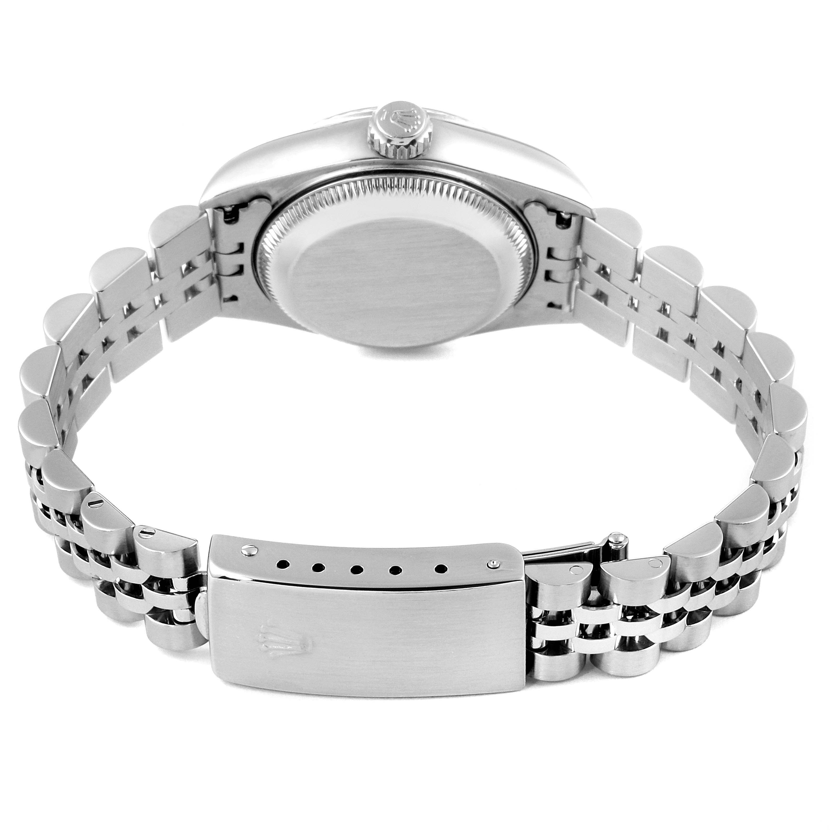 The image shows the backside and bracelet of a Rolex Datejust 79174 Women's Stainless Steel Pink Dial 79174 Women's Stainless Steel Pink Dial watch, highlighting the caseback and clasp.