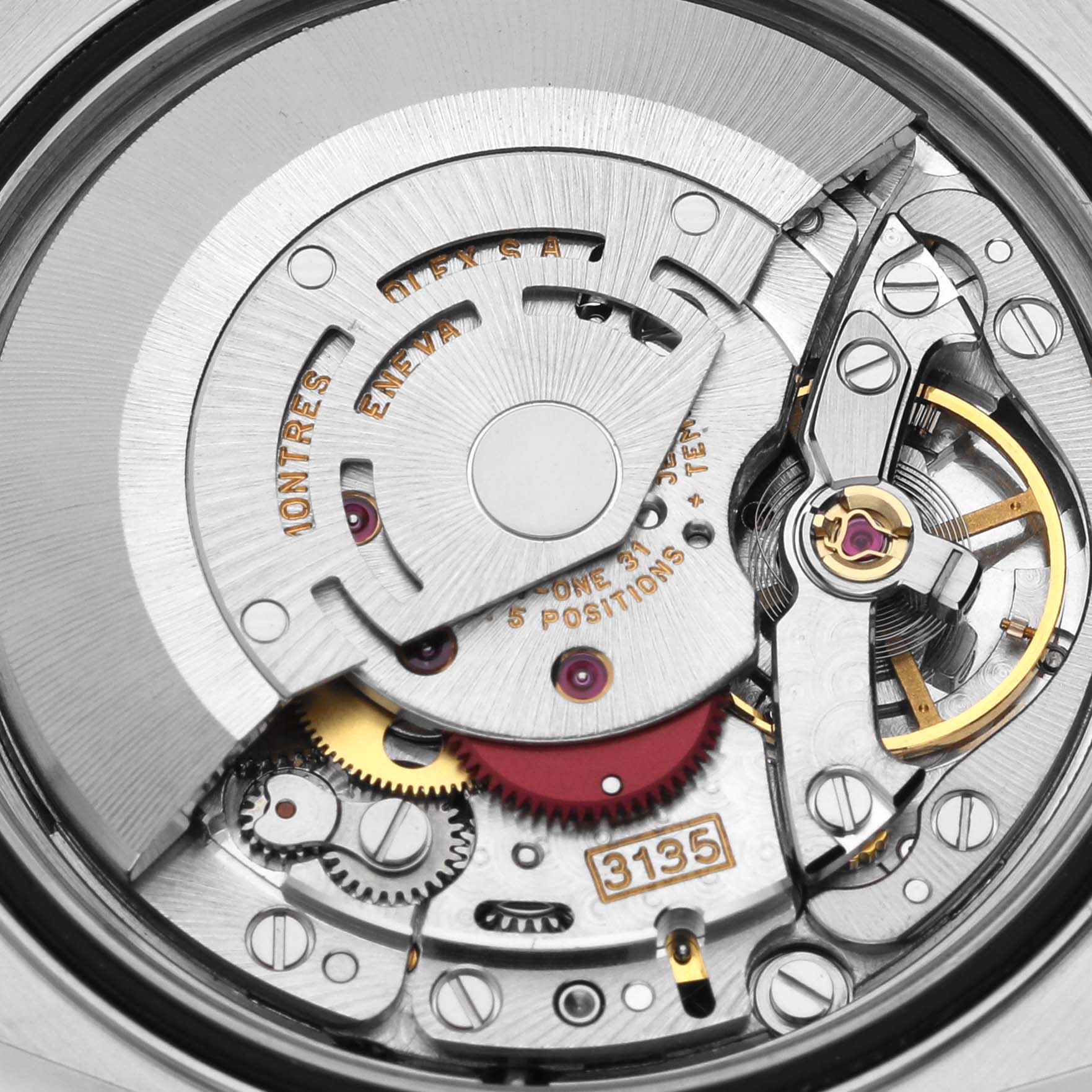 This image shows a close-up of the movement of a Rolex Datejust 16233 Men's Steel and Gold (two tone) White Dial 16233 Men's Steel and Gold (two tone) White Dial, highlighting its intricate mechanical components.