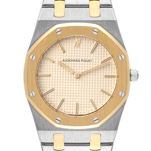 This is a front-angle view of an Audemars Piguet Royal Oak 56303SA Men's Steel and Gold (two tone) Beige Dial 56303SA Men's Steel and Gold (two tone) Beige Dial watch showing its dial, bezel, and a portion of the bracelet.
