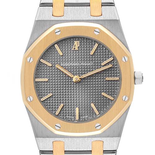The image shows a frontal view of the Audemars Piguet Royal Oak 56303SA Men's Steel and Gold (two tone) Grey Dial 56303SA Men's Steel and Gold (two tone) Grey Dial watch, highlighting the octagonal bezel, dial, and part of the bracelet.