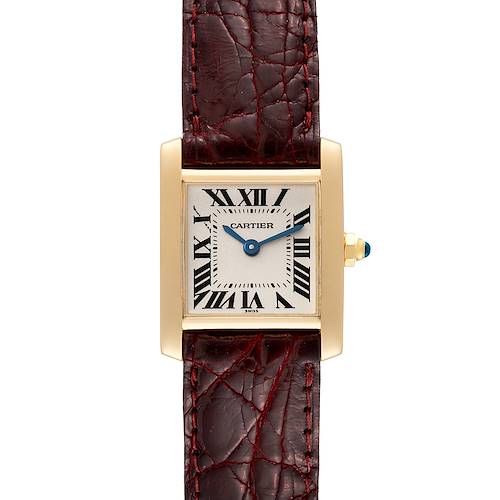 The Cartier Tank Française watch is shown from a vertical angle, highlighting its square dial, gold case, Roman numerals, and leather strap.