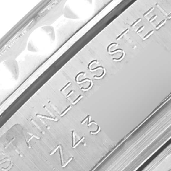 The image shows a close-up angle of the Rolex Yacht-Master 169622 Women's Stainless Steel Silver Dial 169622 Women's Stainless Steel Silver Dial model's stainless steel bezel engraving.