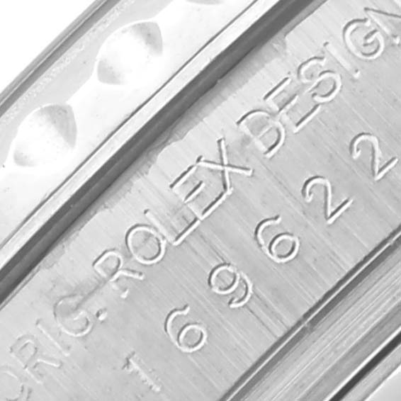 The image shows a close-up of the engraved inner bezel of a Rolex Yacht-Master 169622 Women's Stainless Steel Silver Dial 169622 Women's Stainless Steel Silver Dial watch.