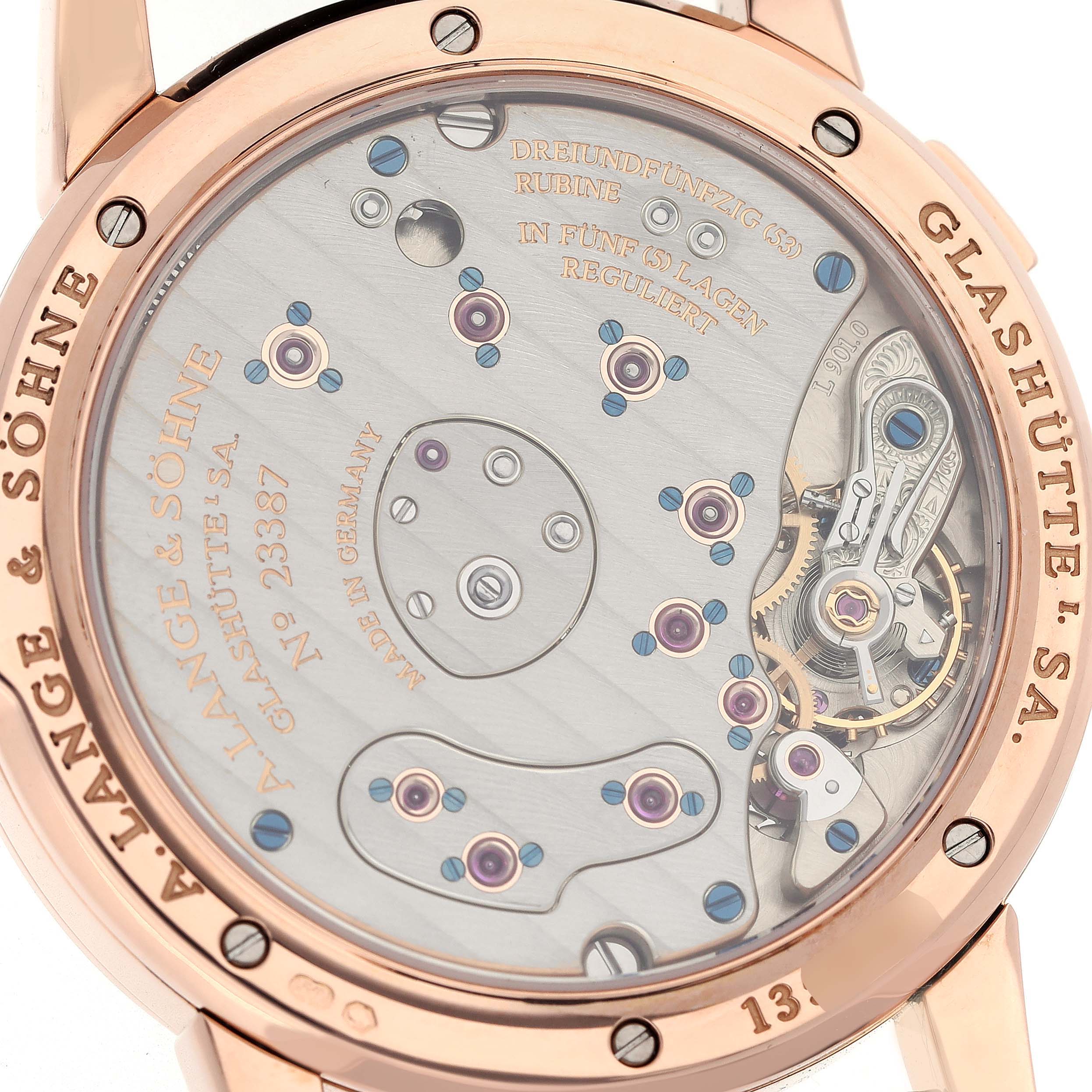 The image shows the open caseback of the A. Lange & Sohne Lange 1 101.031 Men's Rose Gold Black Dial, highlighting its intricate movement details.