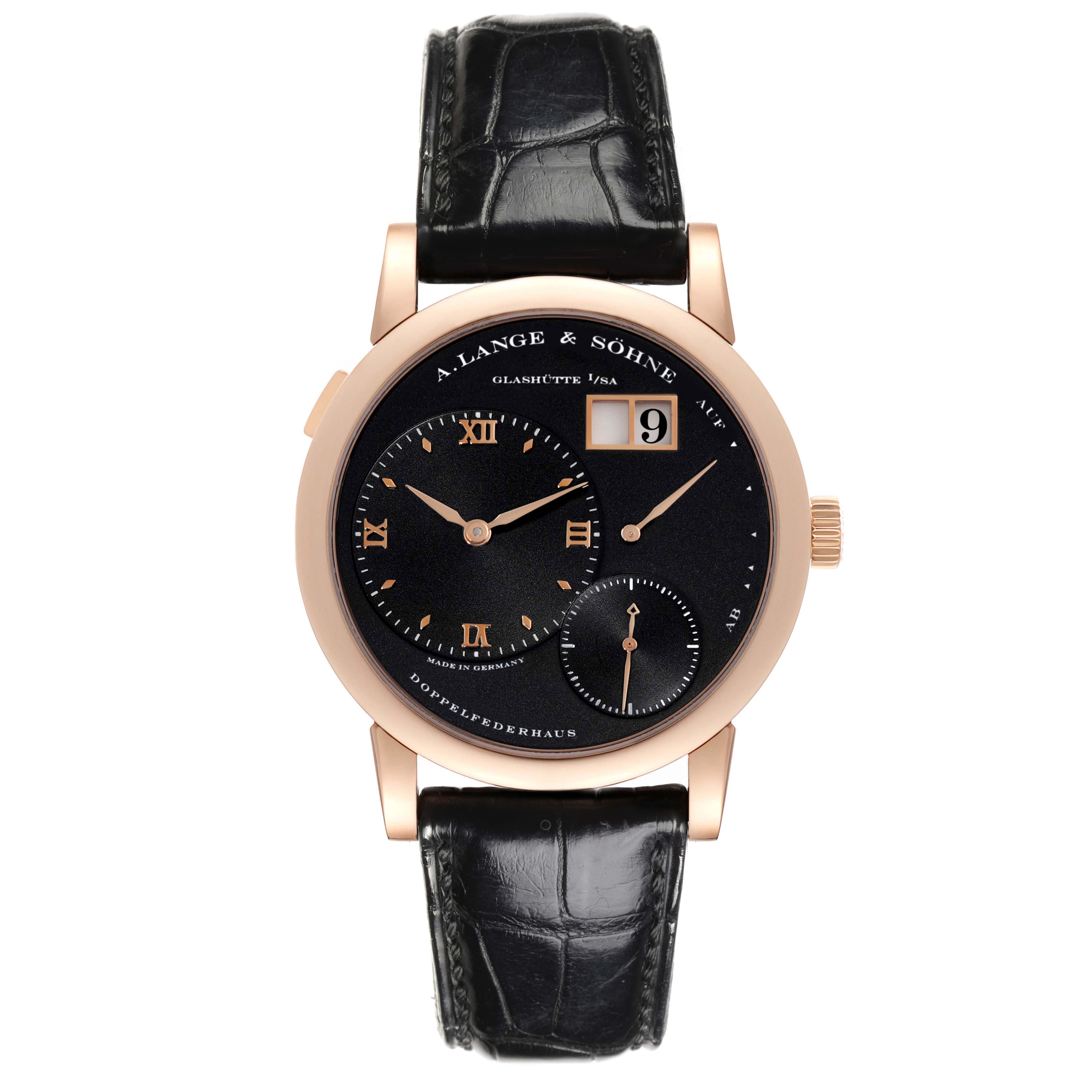 The A. Lange & Sohne Lange 1 101.031 Men's Rose Gold Black Dial watch is shown from the front, displaying the face, dial, hands, and leather strap.