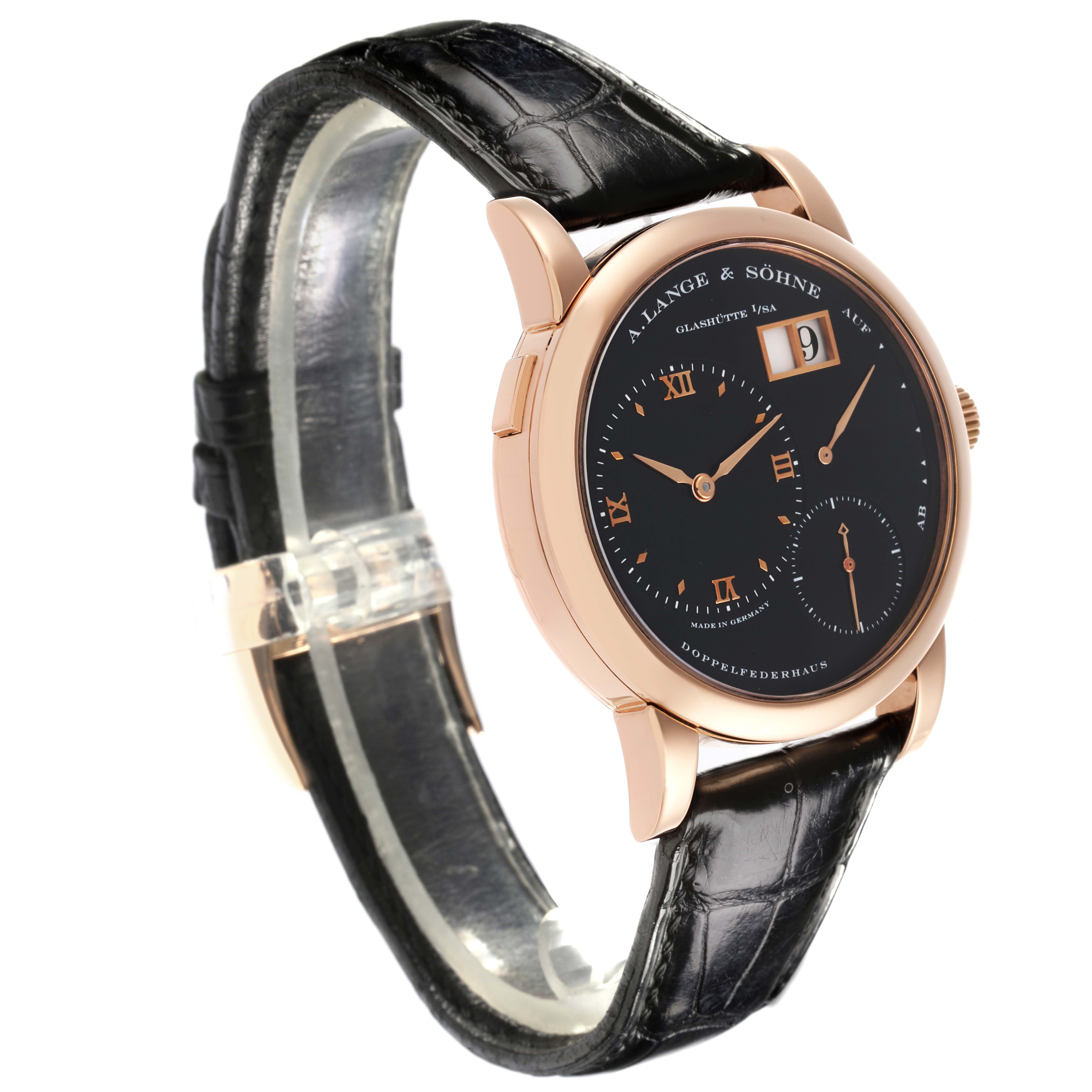 The A. Lange & Sohne Lange 1 101.031 Men's Rose Gold Black Dial watch is shown at a three-quarter angle, highlighting the face, case, and leather strap.