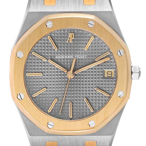 This close-up shows the dial and bezel of the Audemars Piguet Royal Oak 56023SA Men's Steel and Gold (two tone) Grey Dial 56023SA Men's Steel and Gold (two tone) Grey Dial watch, highlighting its octagonal bezel and detailed face.