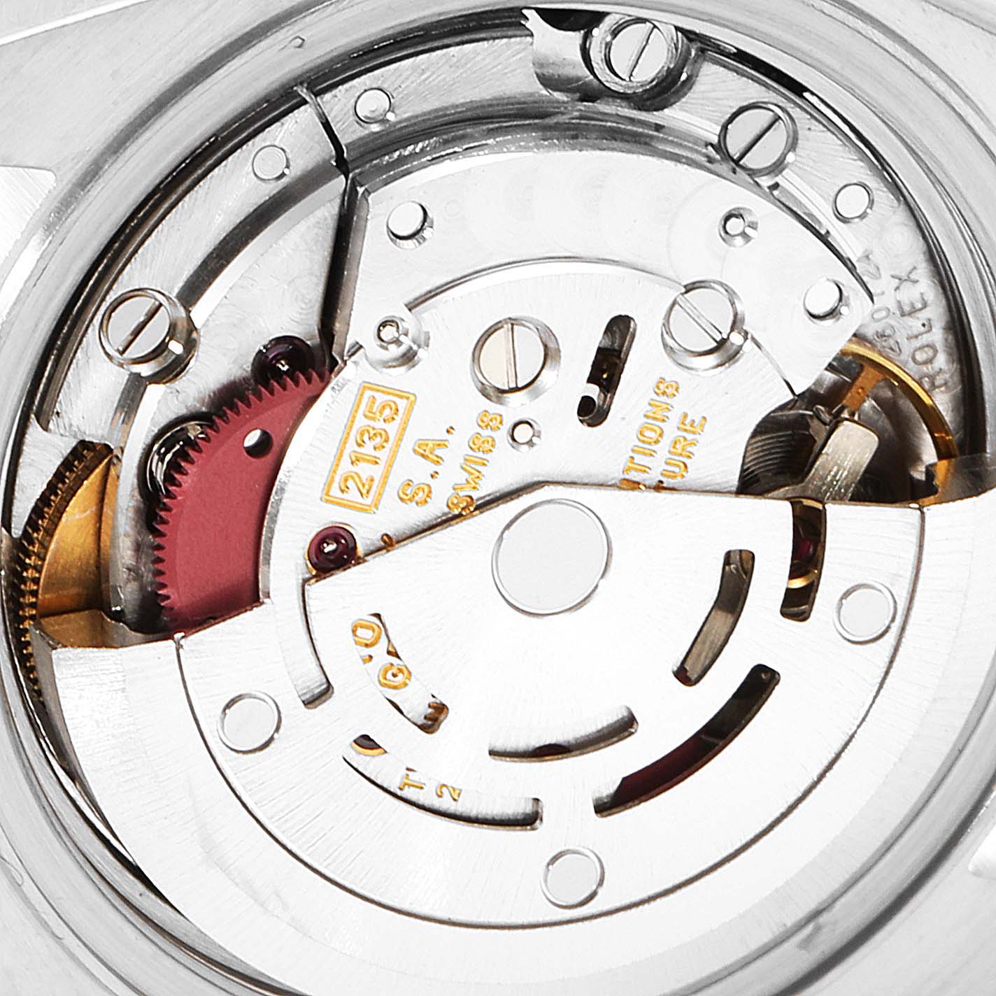 This image shows a close-up view of the movement inside a Rolex Datejust 69173 Women's Steel and Gold (two tone) Champagne Dial 69173 Women's Steel and Gold (two tone) Champagne Dial watch, highlighting its internal mechanical parts.