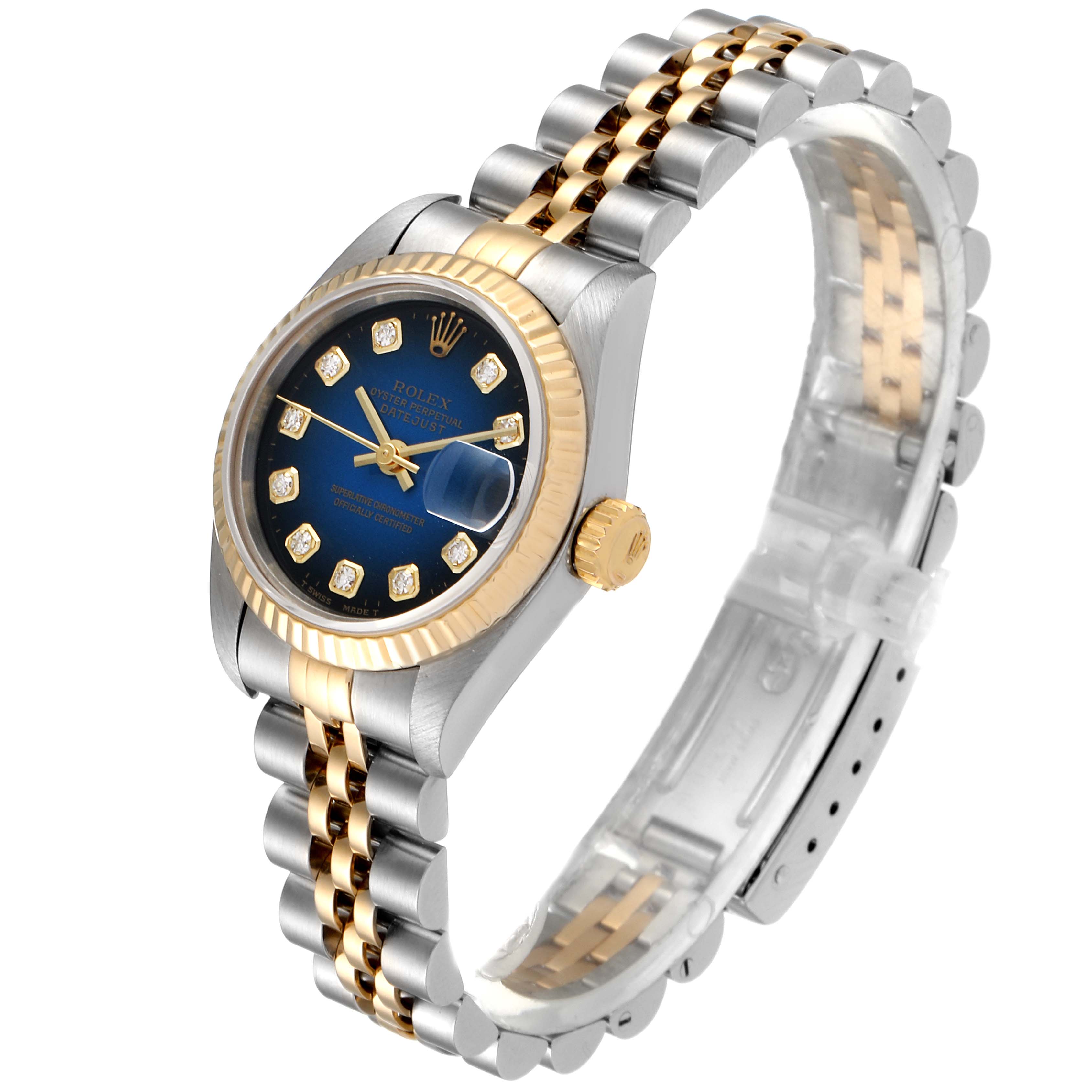 This image shows a Rolex Datejust 69173 Women's Steel and Gold (two tone) Blue Dial 69173 Women's Steel and Gold (two tone) Blue Dial watch with a gold and silver bracelet, blue dial, and a cyclops lens over the date window, viewed at an angle.